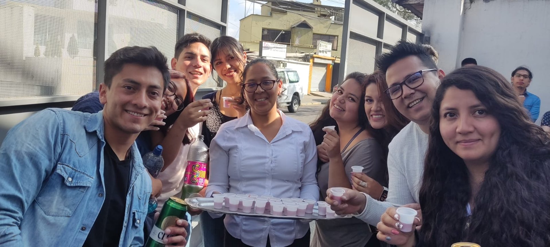 an abstract photo of a curved building with a blue sky in the background