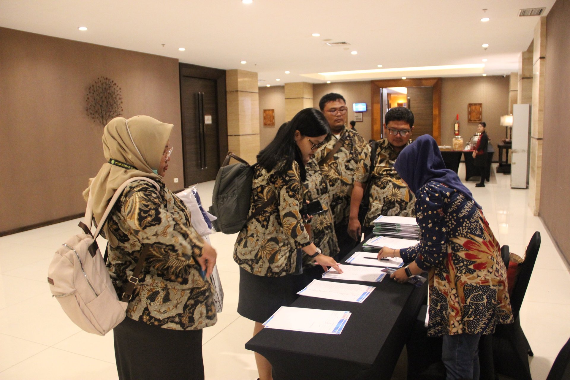 an abstract photo of a curved building with a blue sky in the background