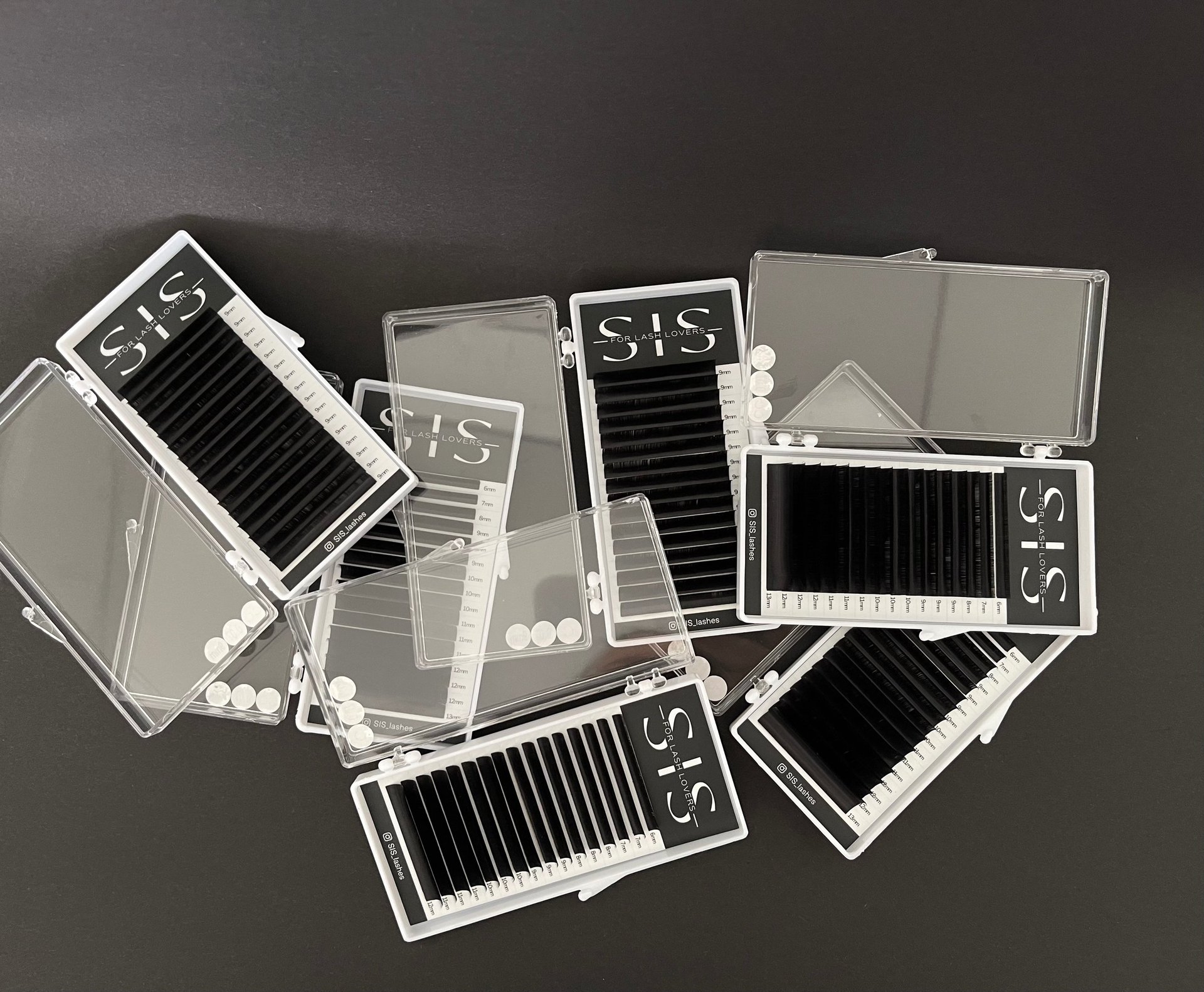 a close up of a black and brown abstract painting