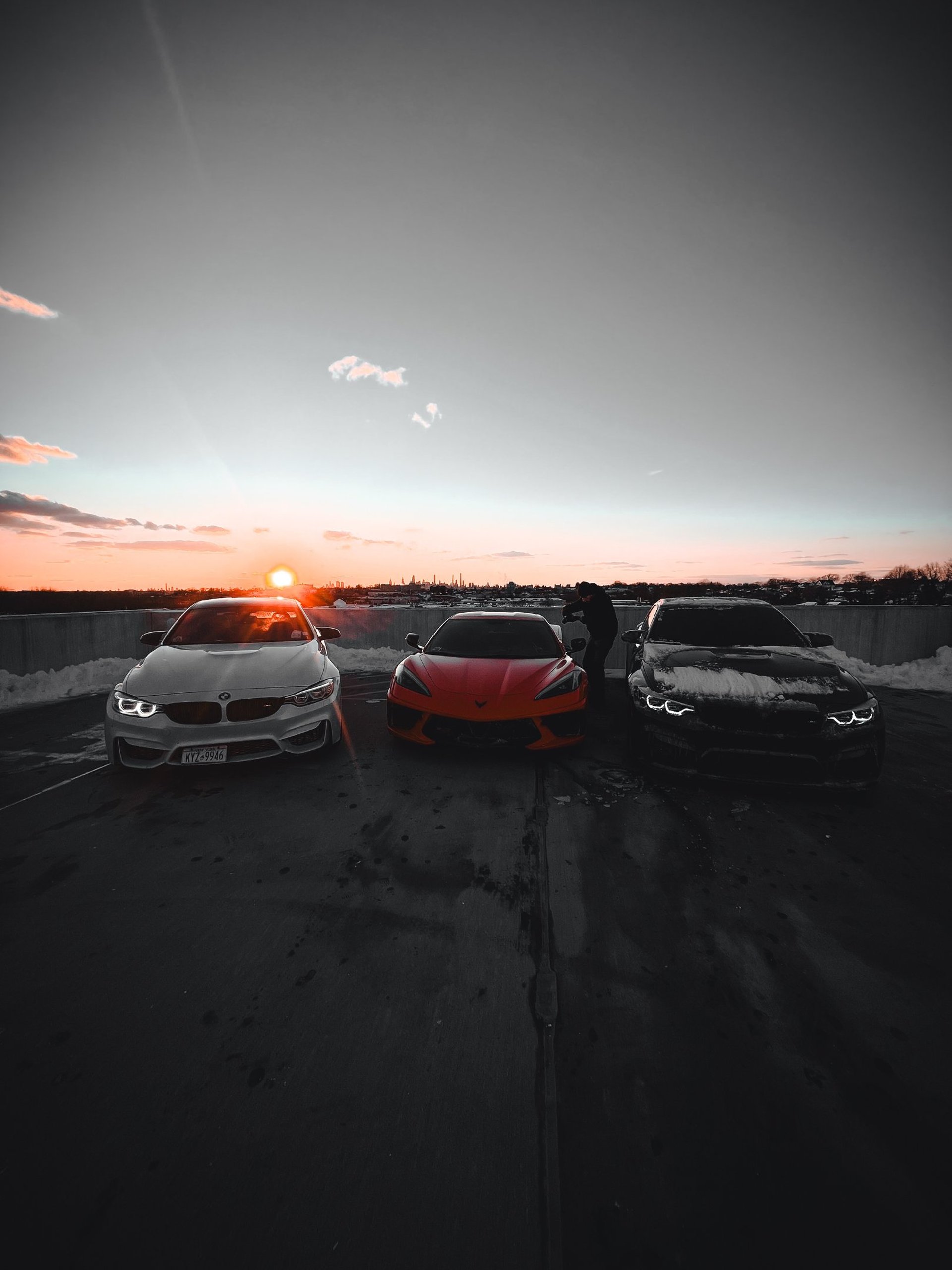an abstract photo of a curved building with a blue sky in the background