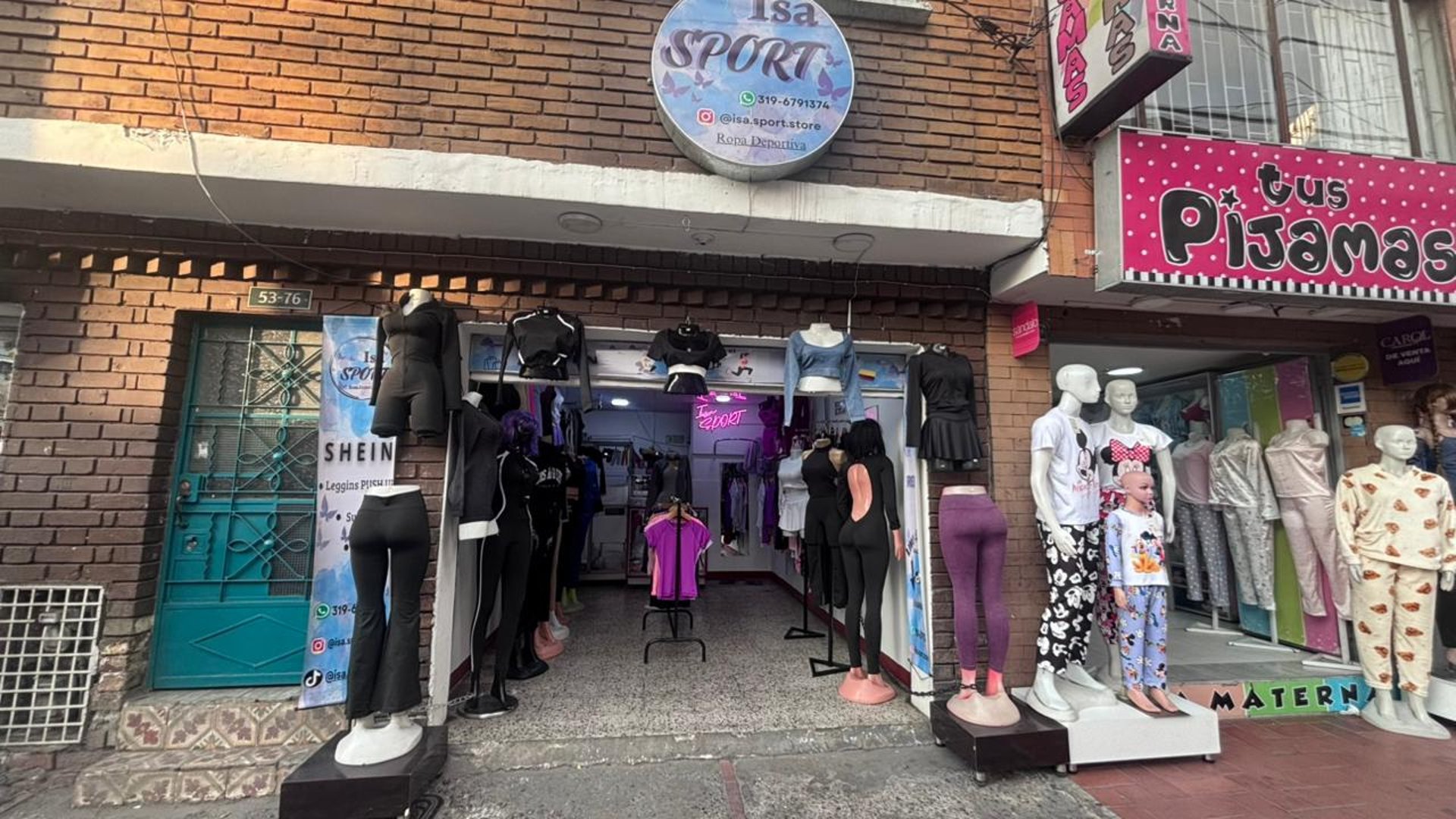 woman wearing sport bra standing on gym floors