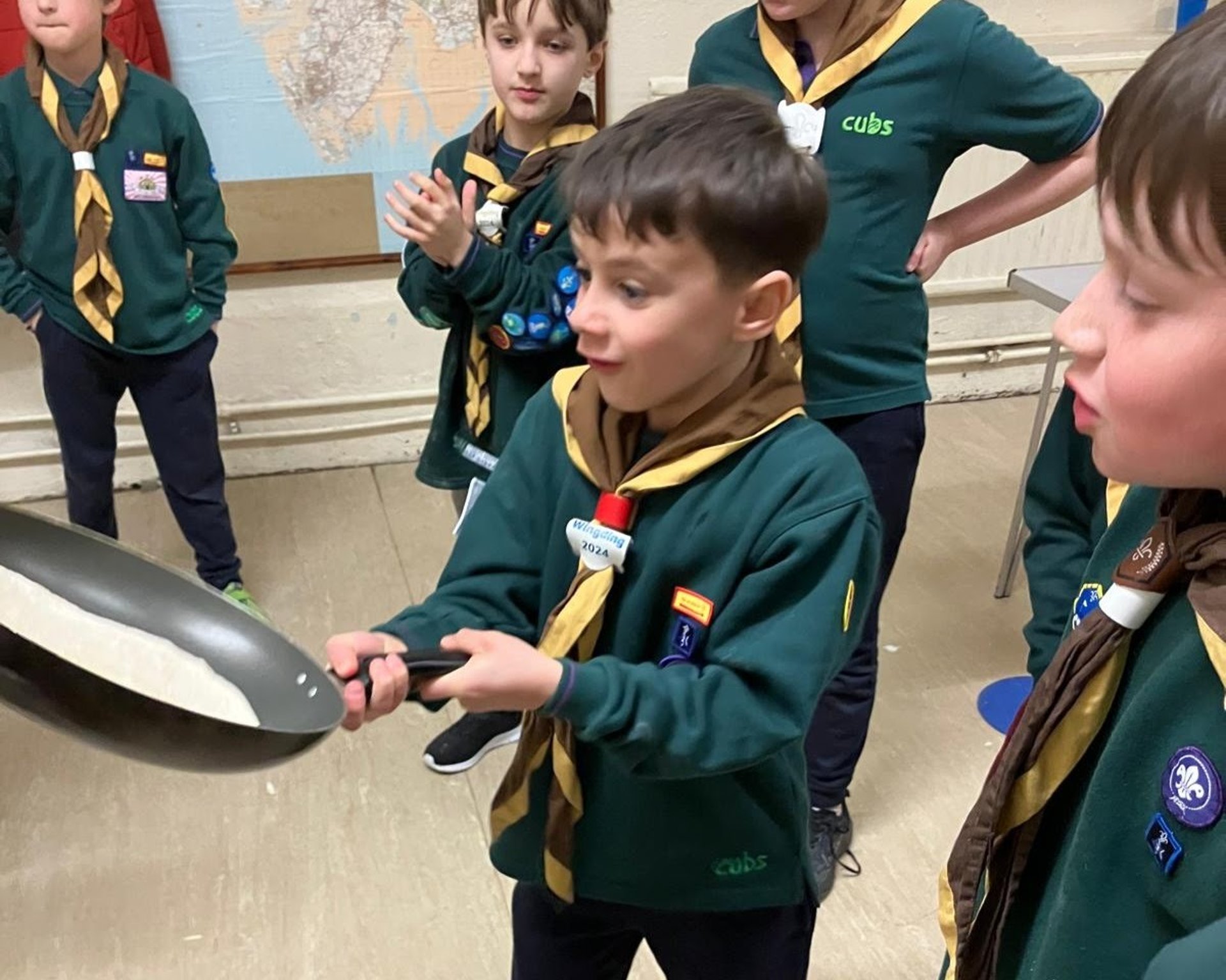 an abstract photo of a curved building with a blue sky in the background