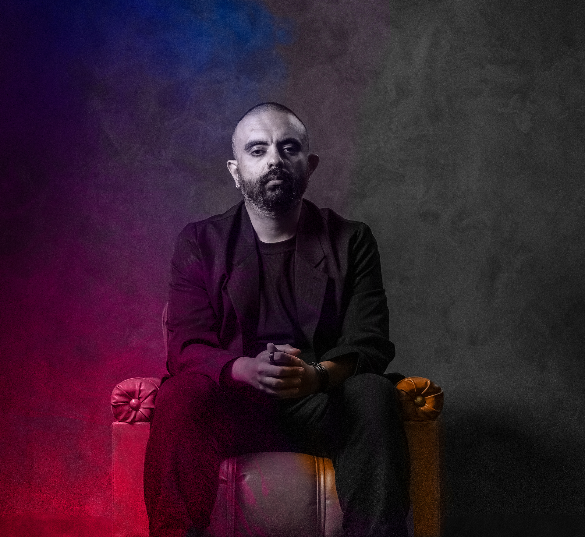 black and brown leather padded tub sofa