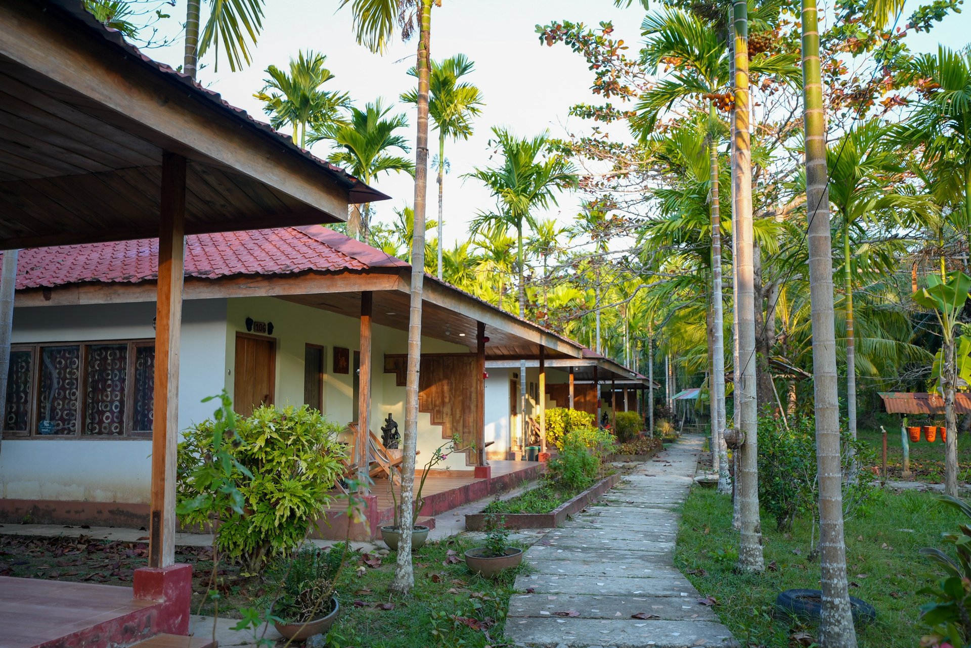 an abstract photo of a curved building with a blue sky in the background