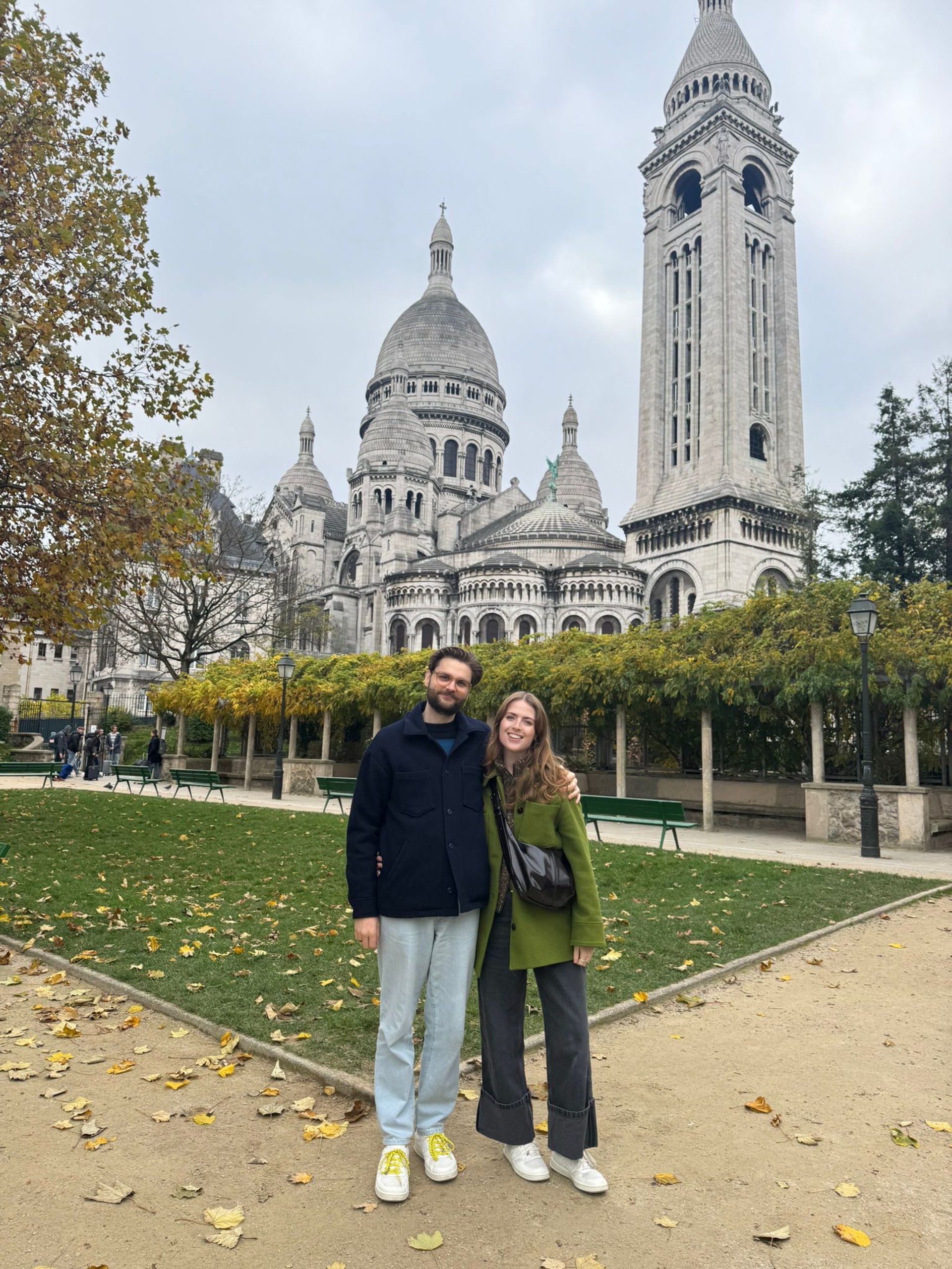 an abstract photo of a curved building with a blue sky in the background