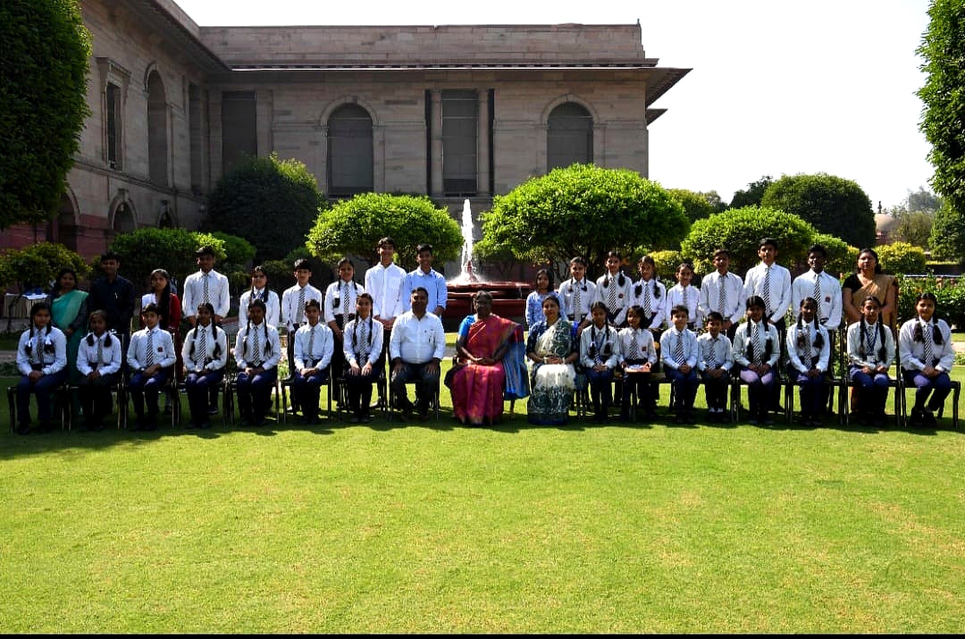 black and brown leather padded tub sofa