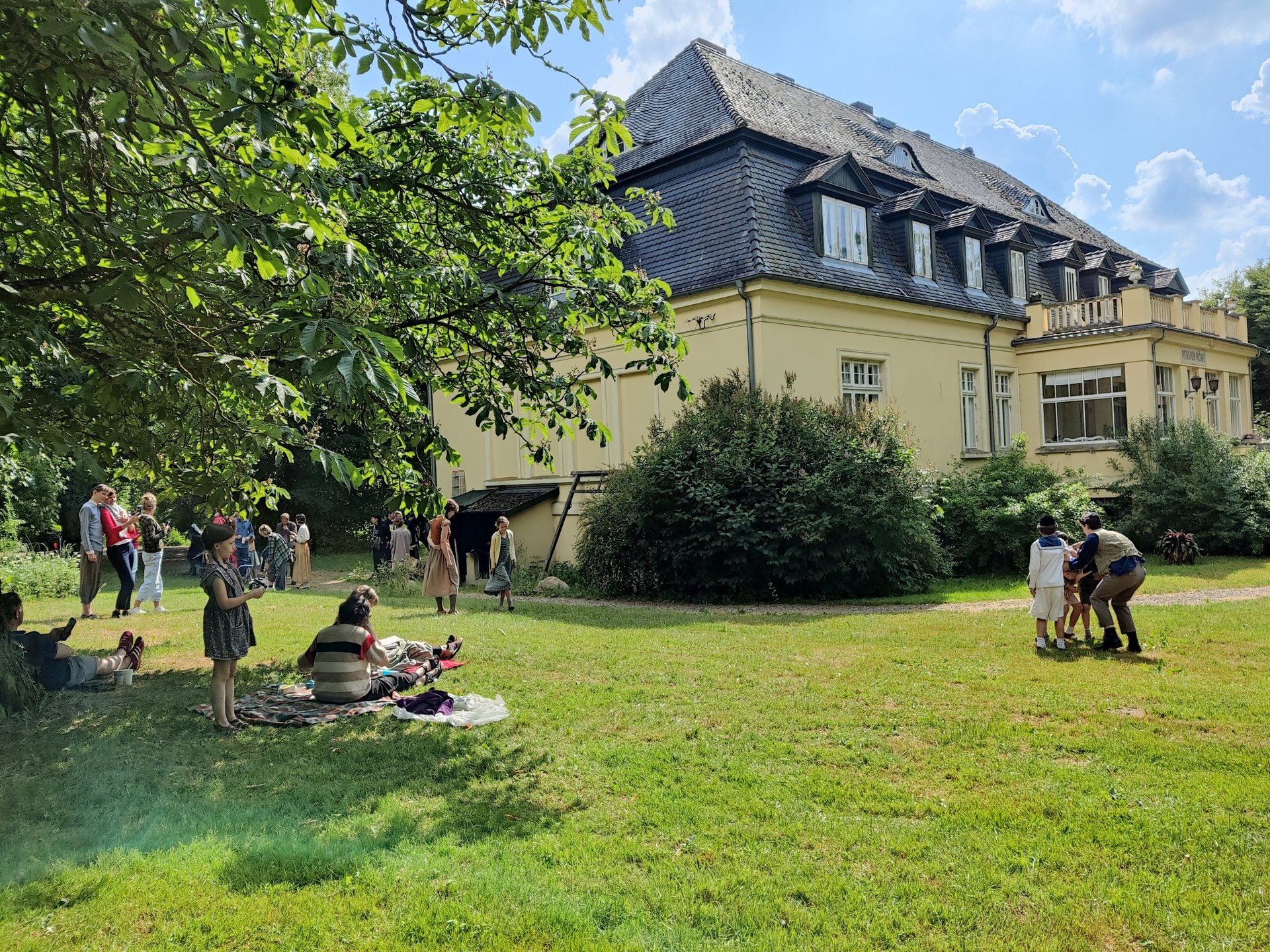 an abstract photo of a curved building with a blue sky in the background