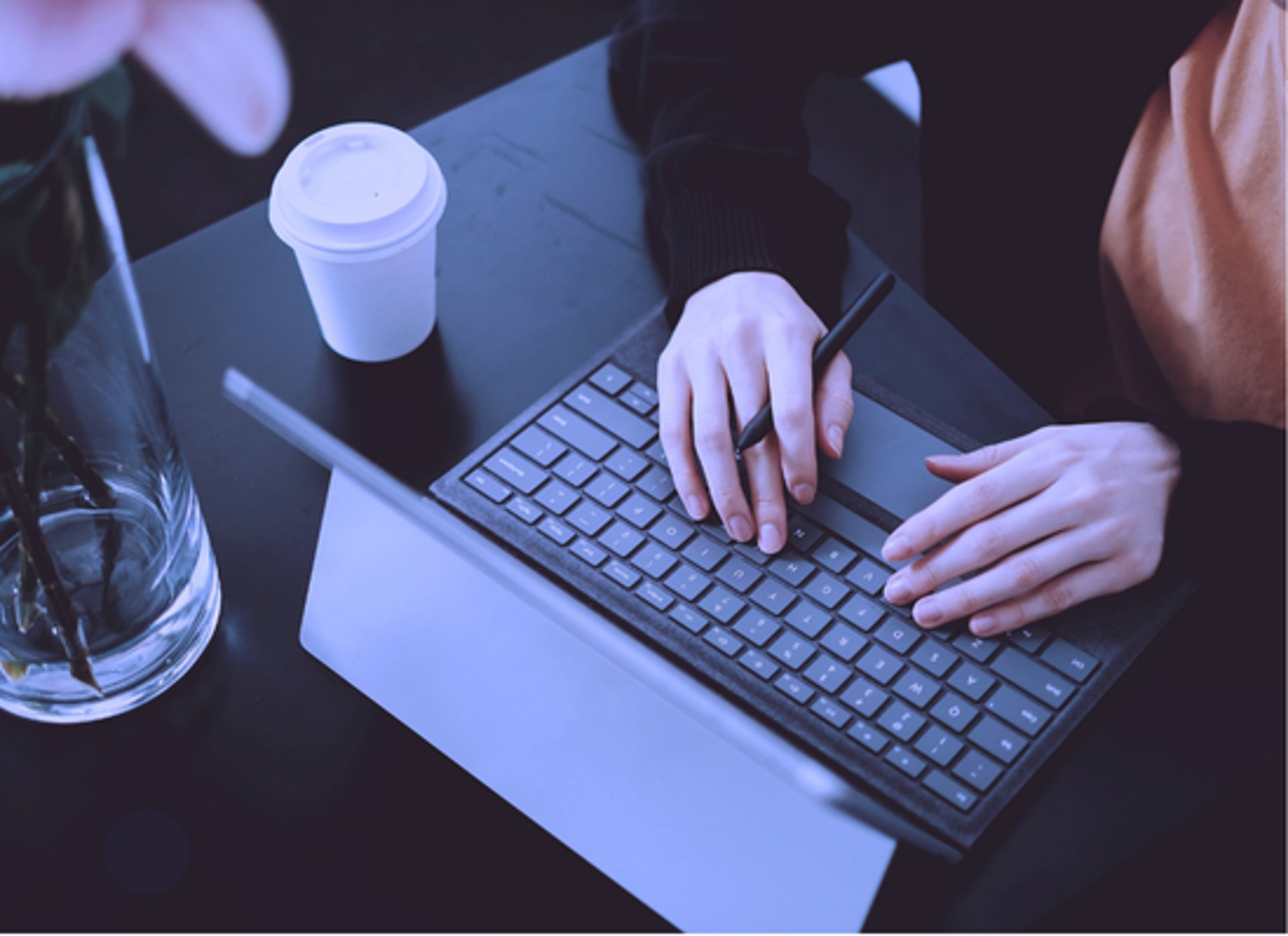 an abstract photo of a curved building with a blue sky in the background