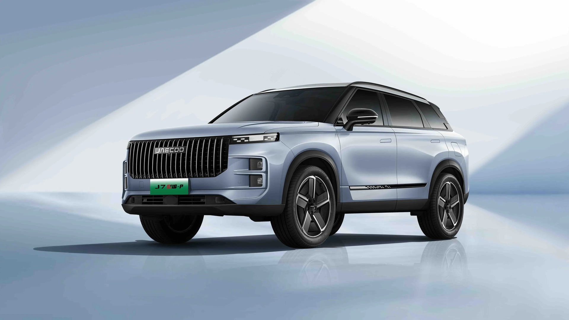 an abstract photo of a curved building with a blue sky in the background