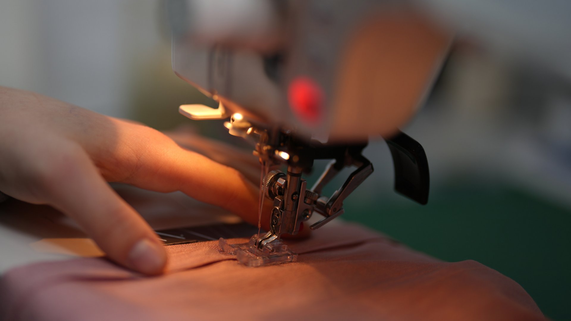 person wearing grey knit sweater