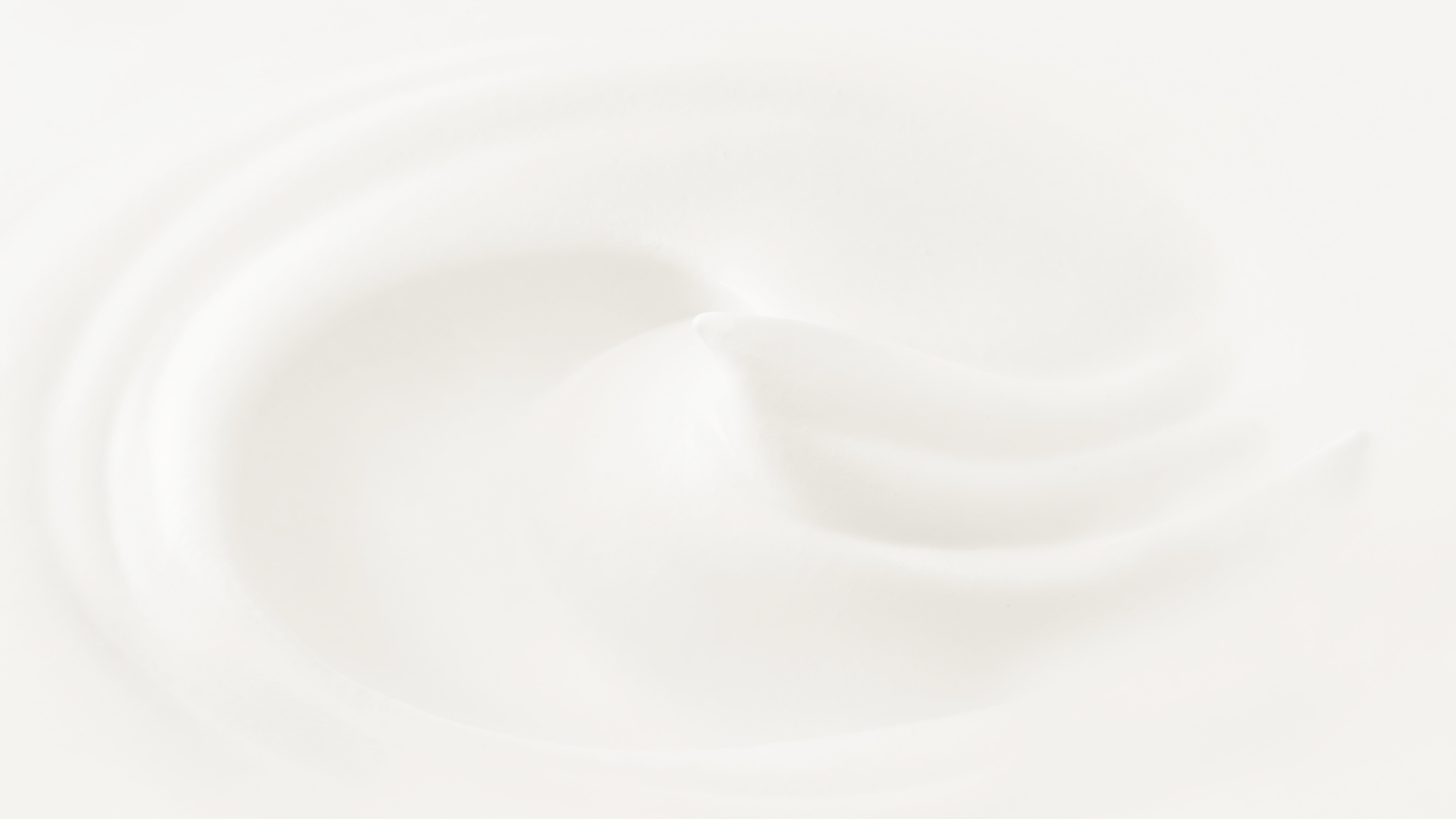 white round ornament on white sand