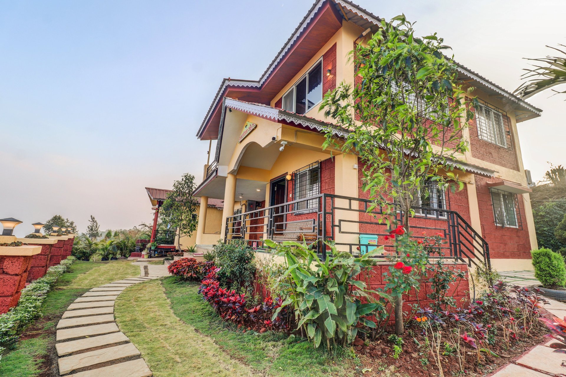 woman wearing yellow long-sleeved dress under white clouds and blue sky during daytime