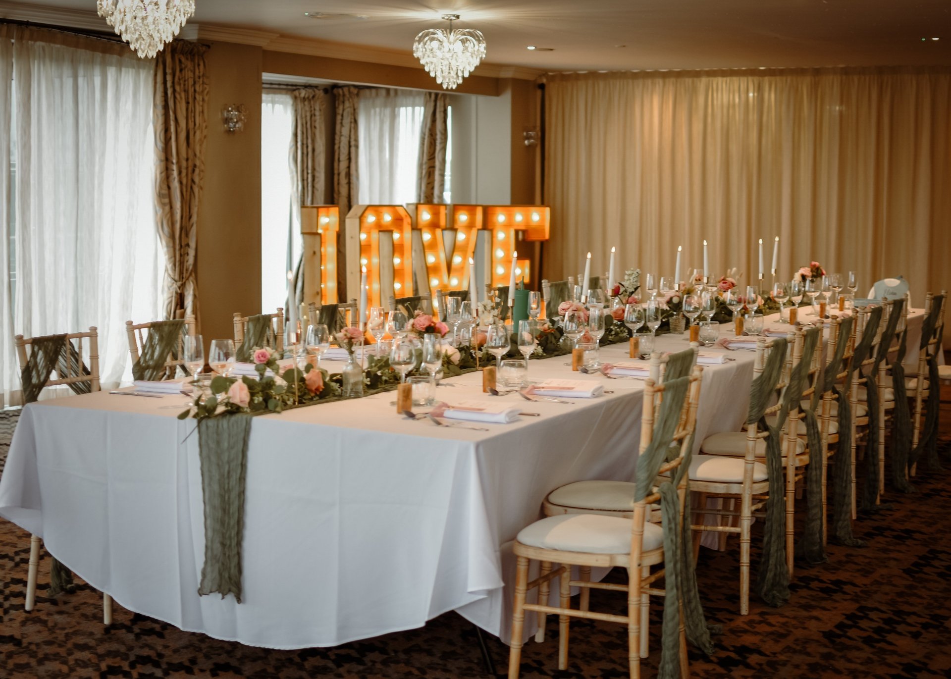 black and brown leather padded tub sofa