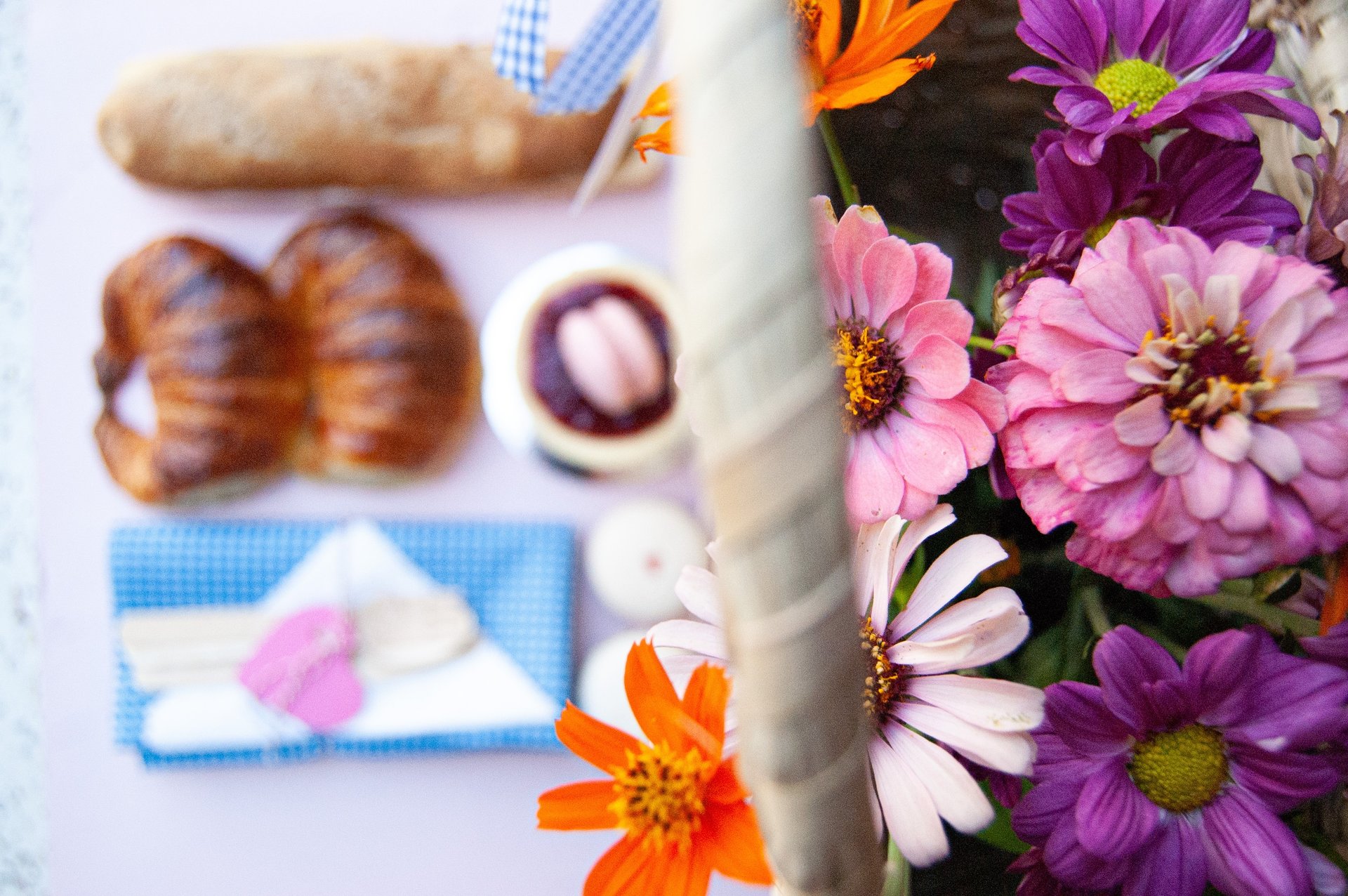 person holding white ice cream cone with brown and white round cake