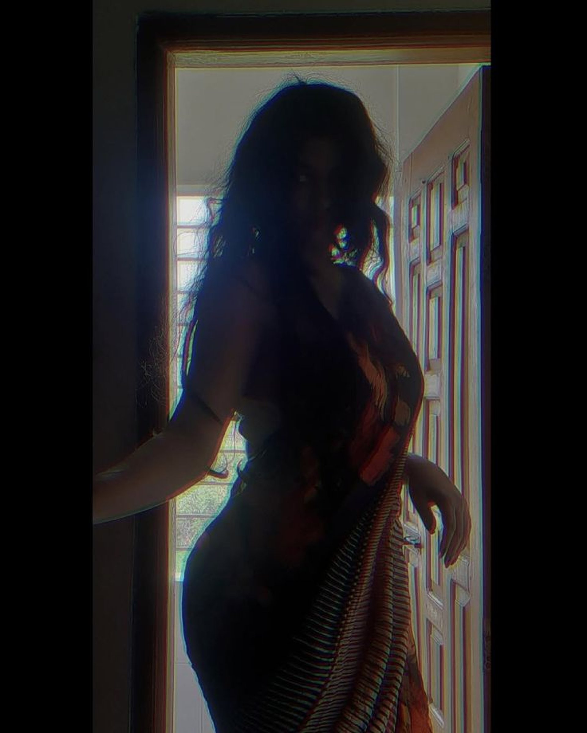 two women standing next to each other at a party