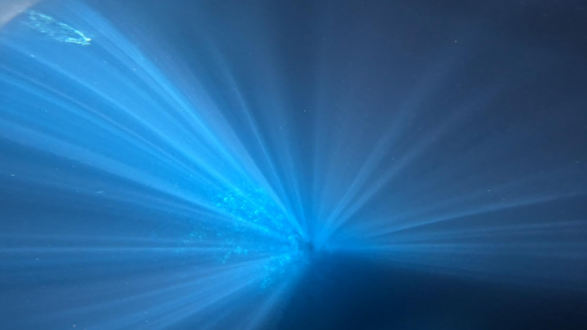 woman wearing yellow long-sleeved dress under white clouds and blue sky during daytime