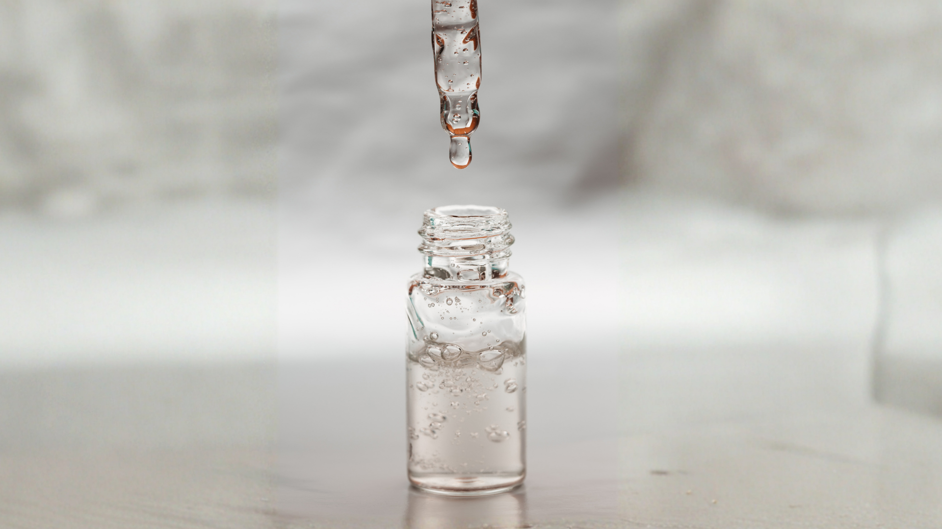 an abstract photo of a curved building with a blue sky in the background