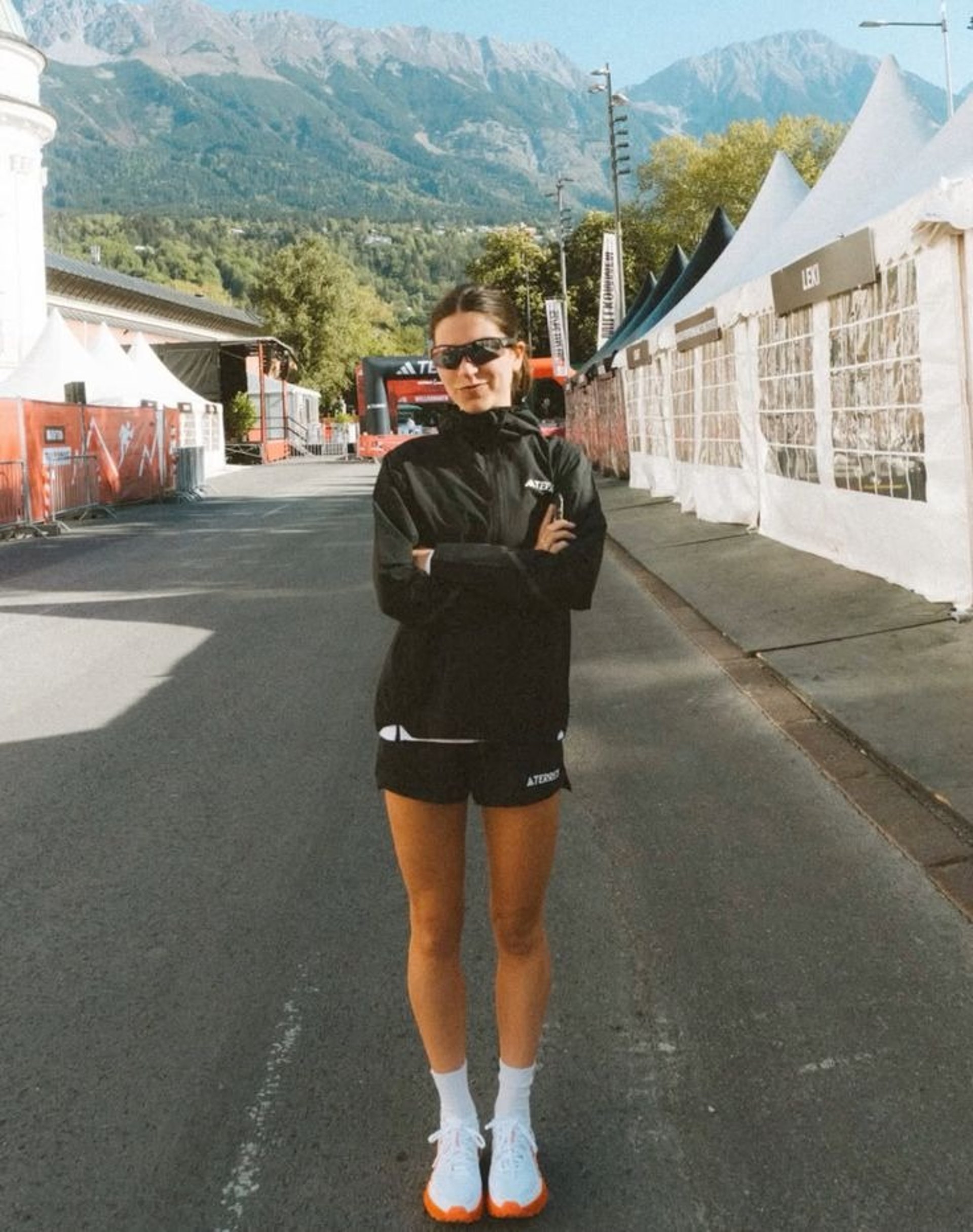 an abstract photo of a curved building with a blue sky in the background