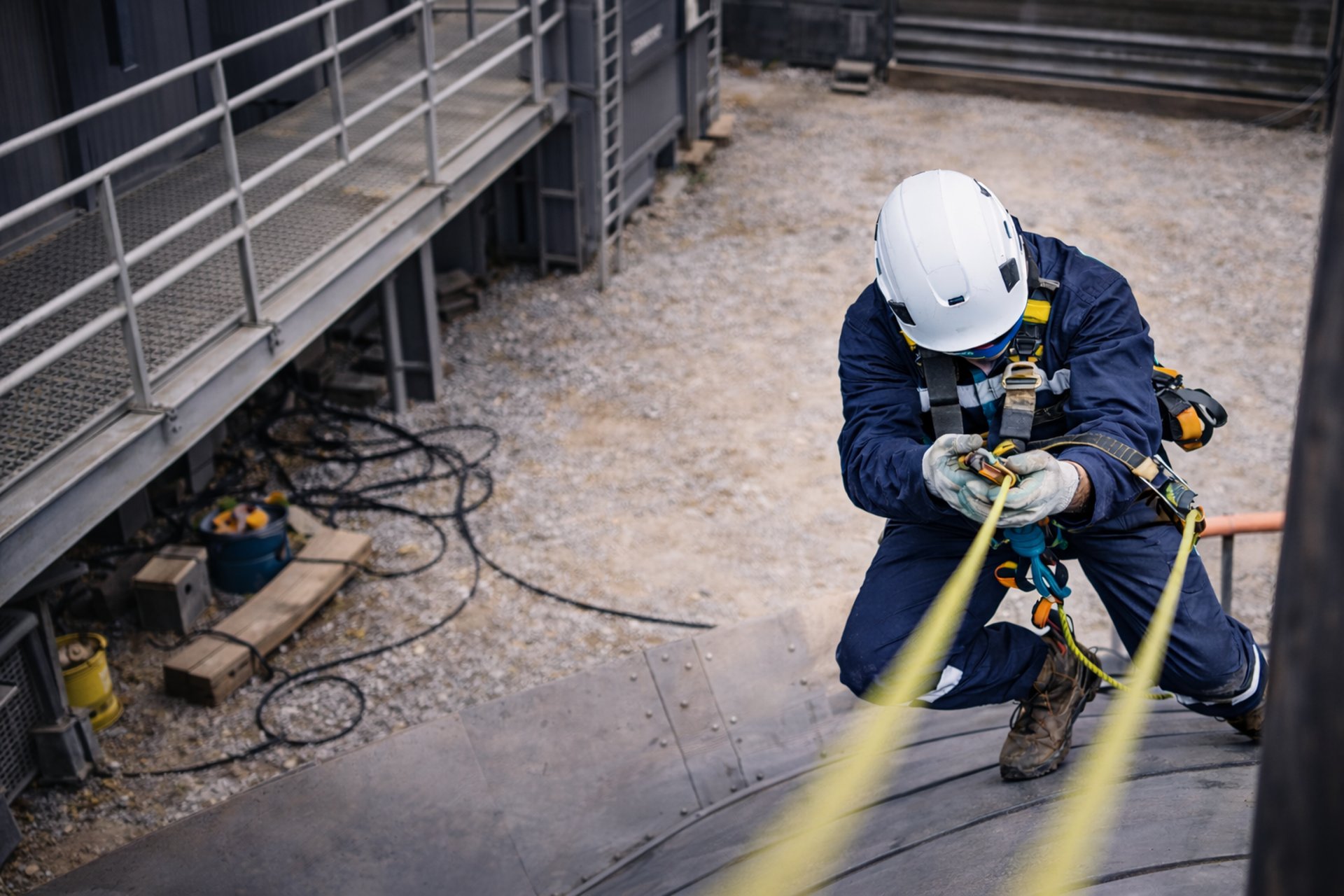 an abstract photo of a curved building with a blue sky in the background