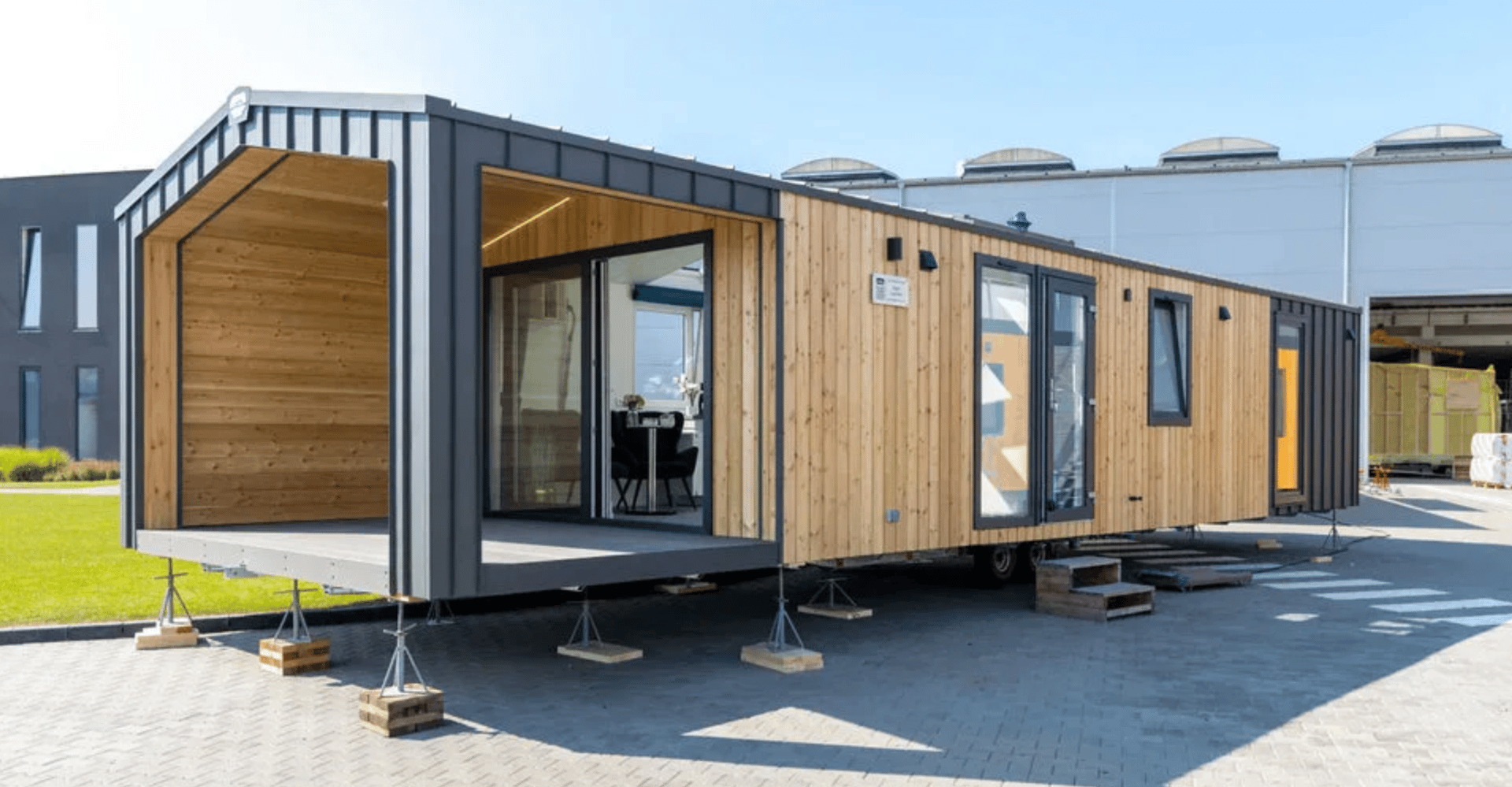 an abstract photo of a curved building with a blue sky in the background