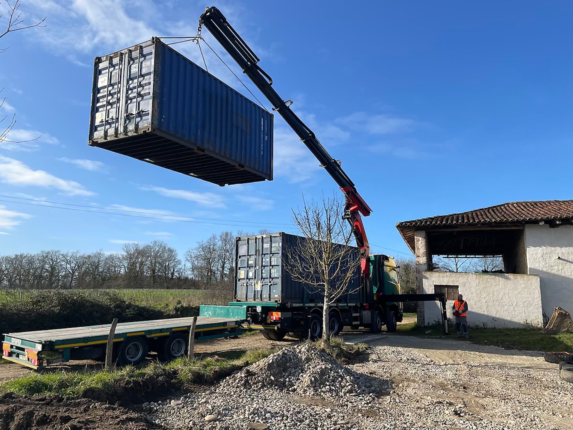 person wearing grey knit sweater