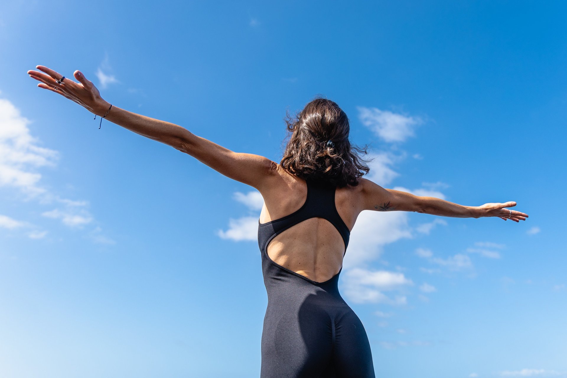 person wearing grey knit sweater