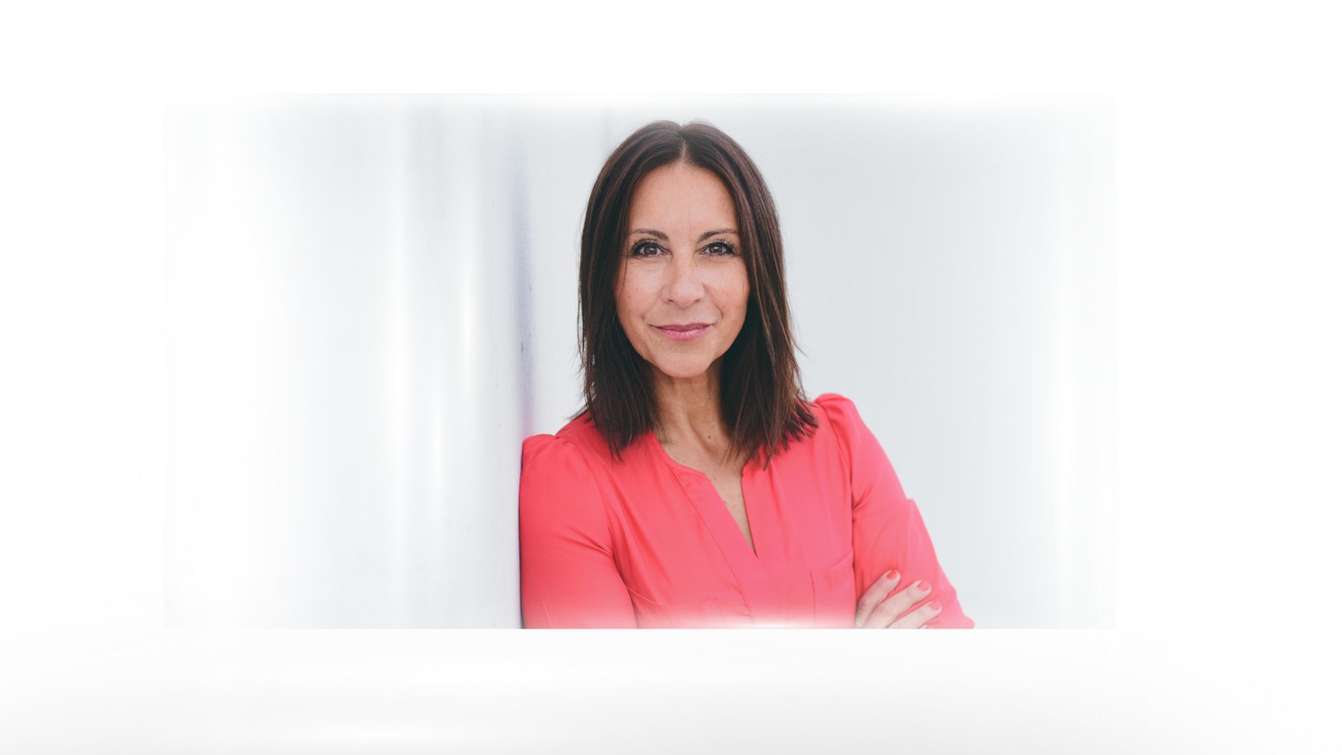 an abstract photo of a curved building with a blue sky in the background