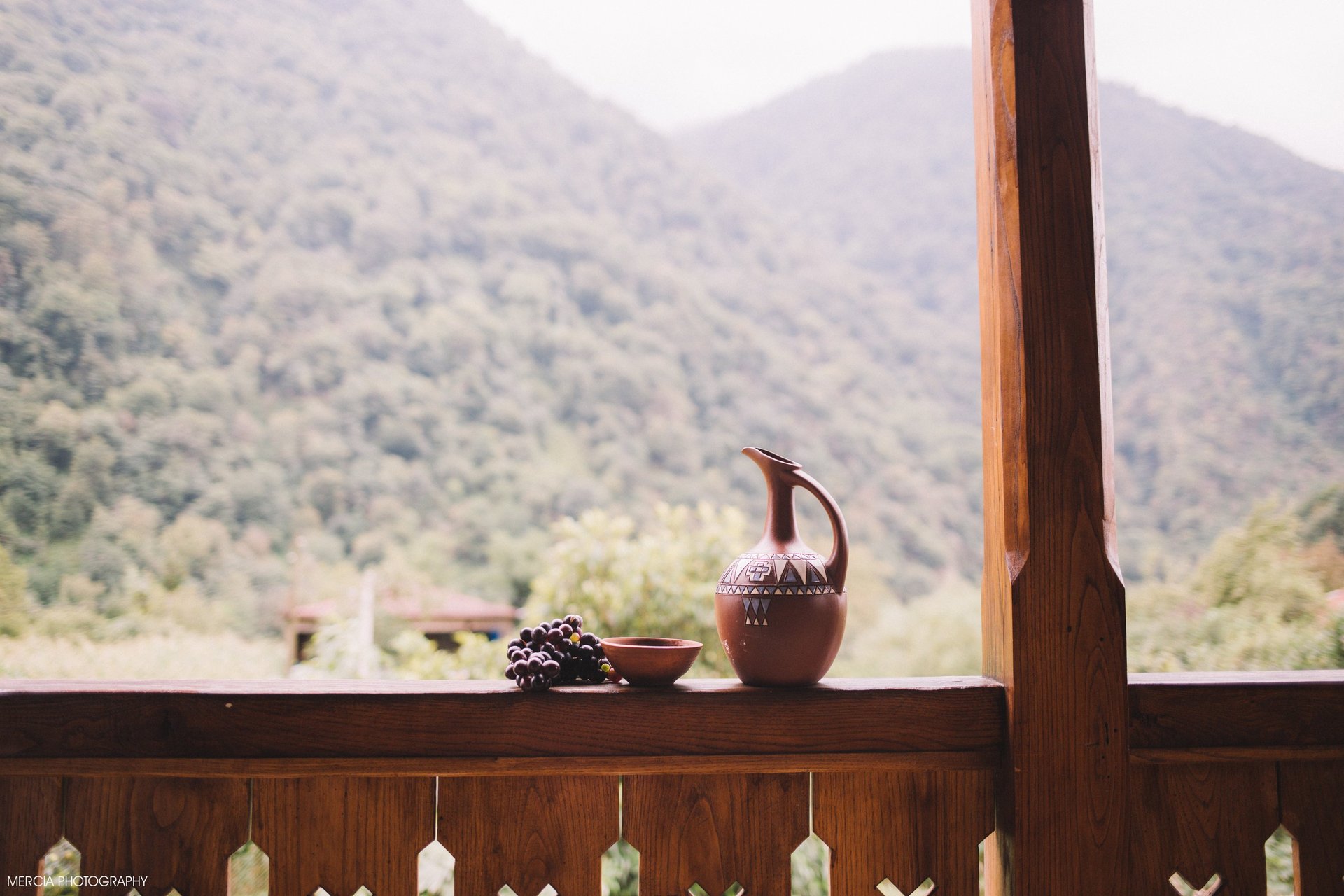 an abstract photo of a curved building with a blue sky in the background