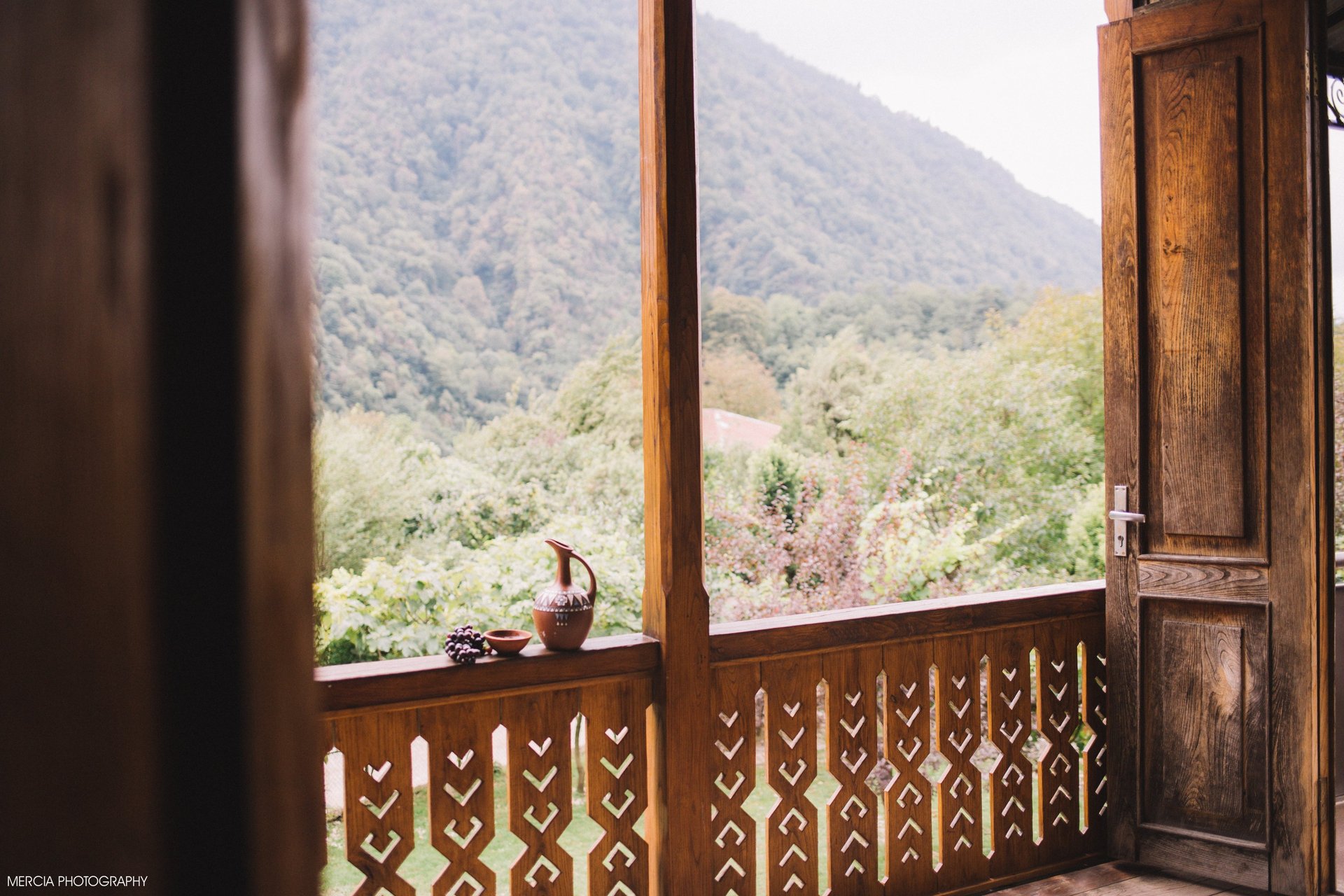 an abstract photo of a curved building with a blue sky in the background