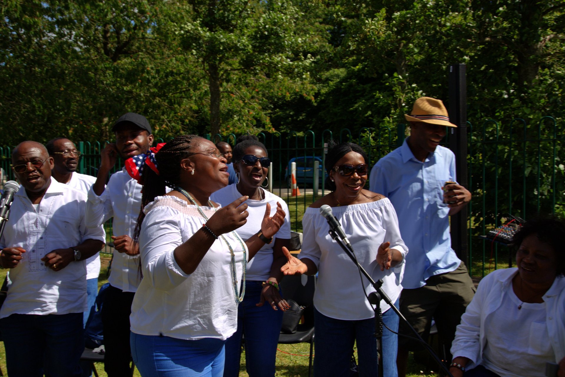 an abstract photo of a curved building with a blue sky in the background