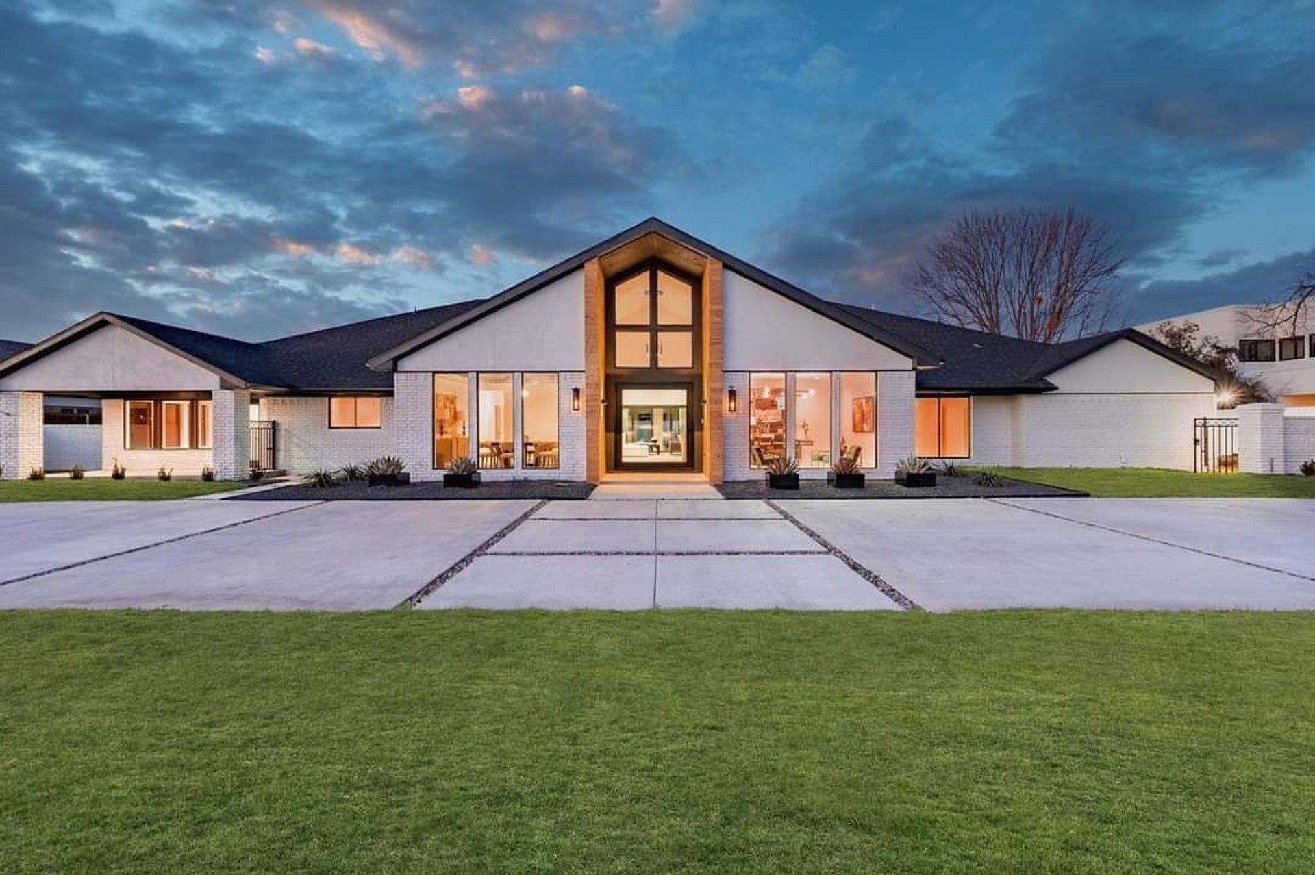 black and brown leather padded tub sofa