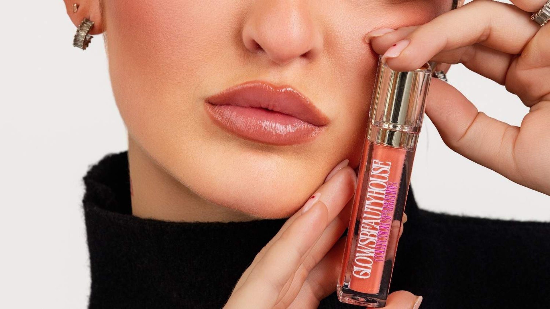 person wearing grey knit sweater