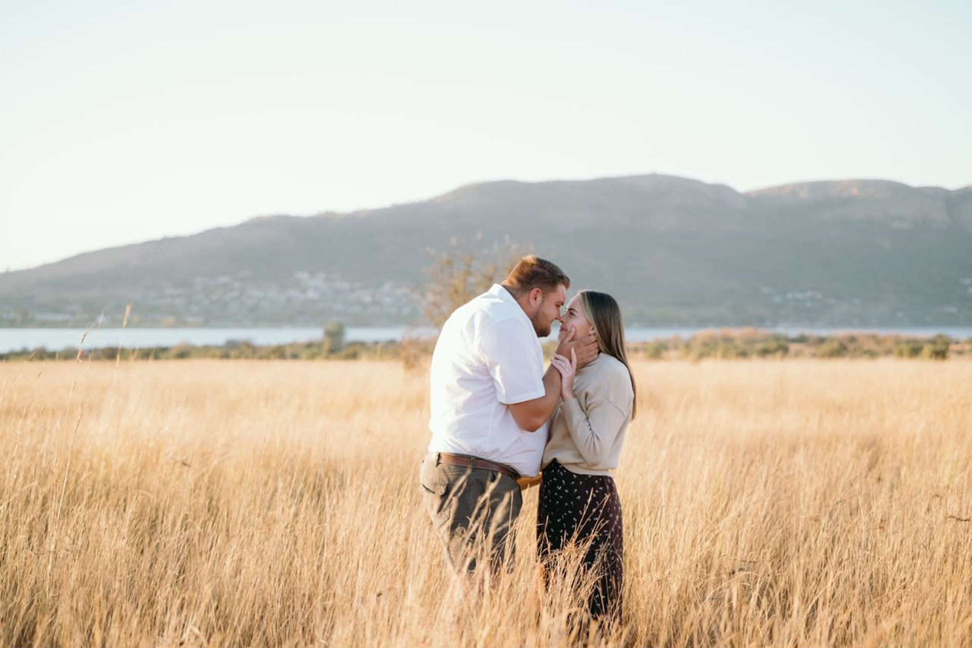couple wearing silver-colored rings