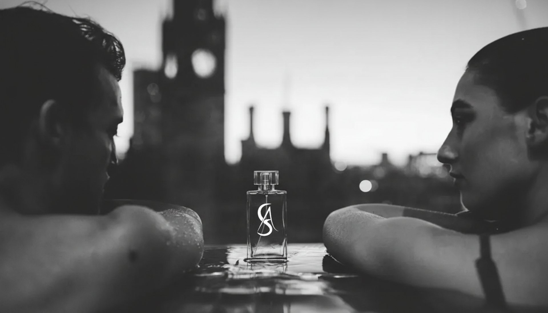 A group of perfume bottles sitting on top of a table