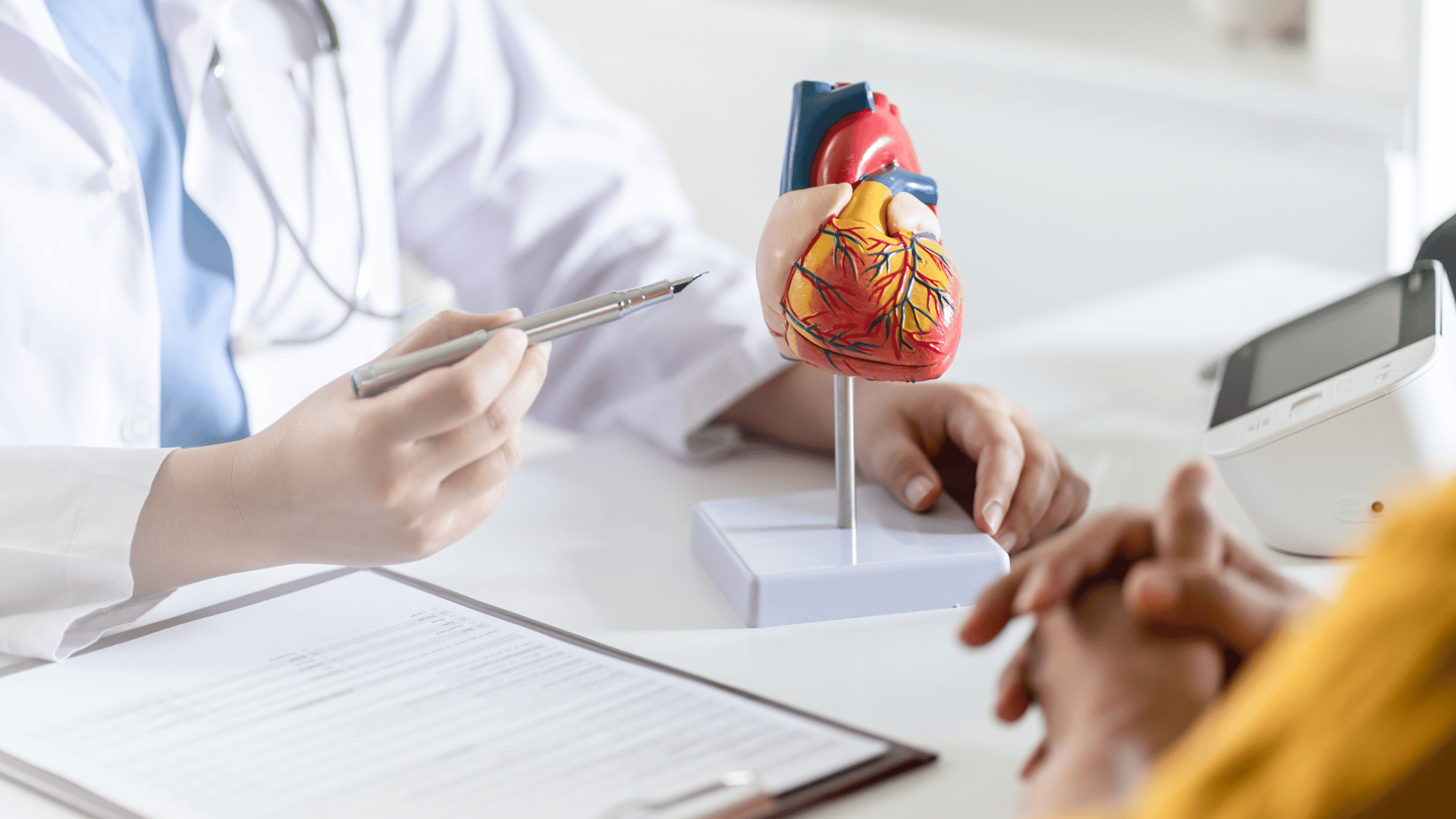 person writing on white paper