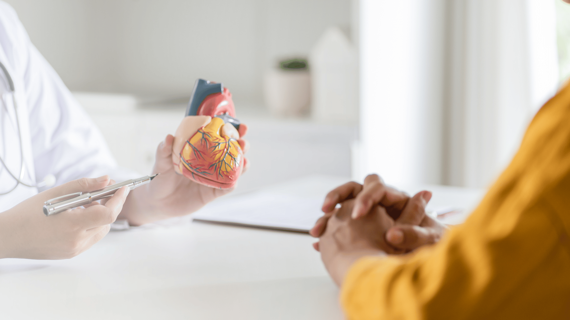 person writing on white paper