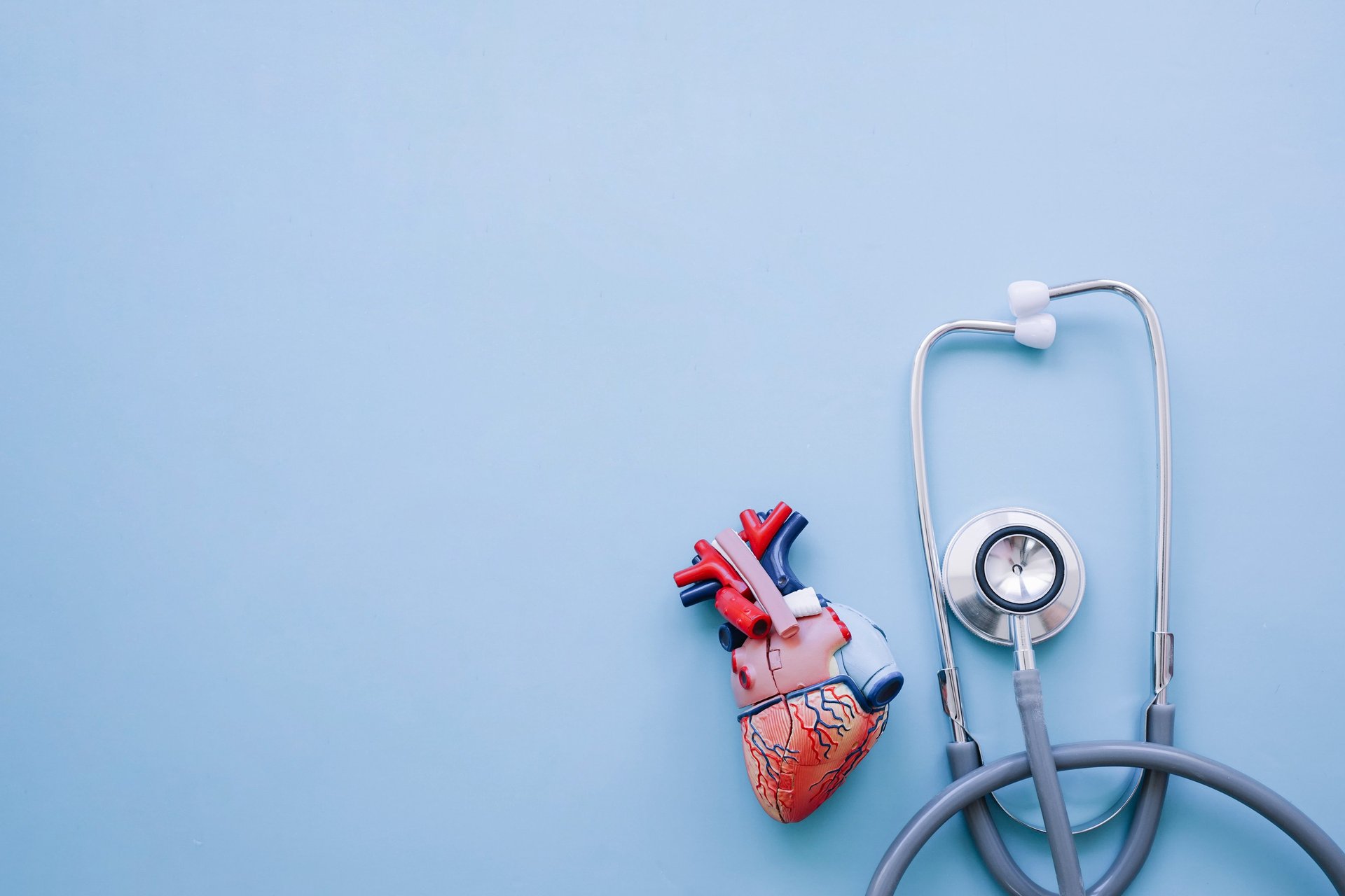 person writing on white paper