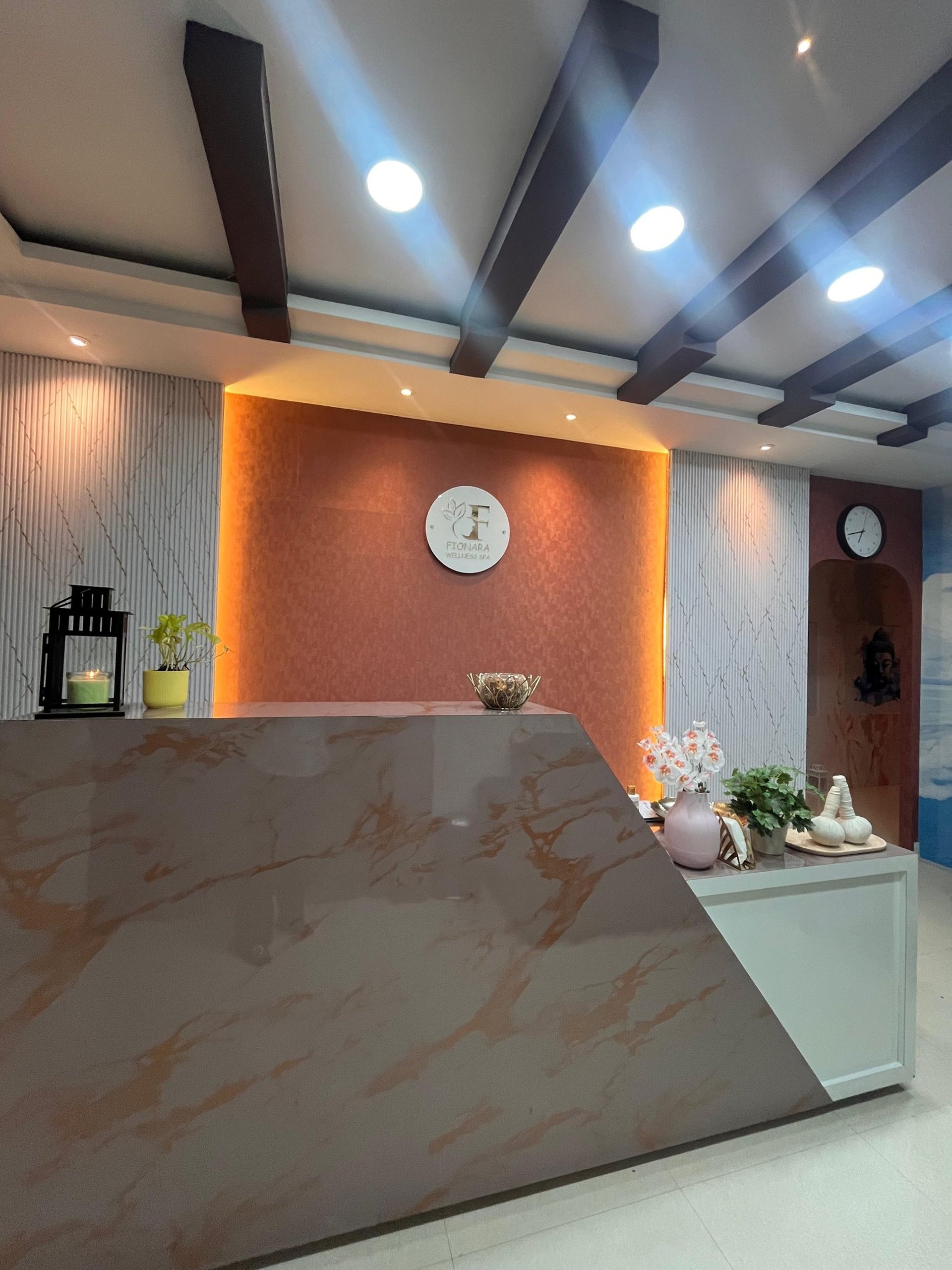 an abstract photo of a curved building with a blue sky in the background