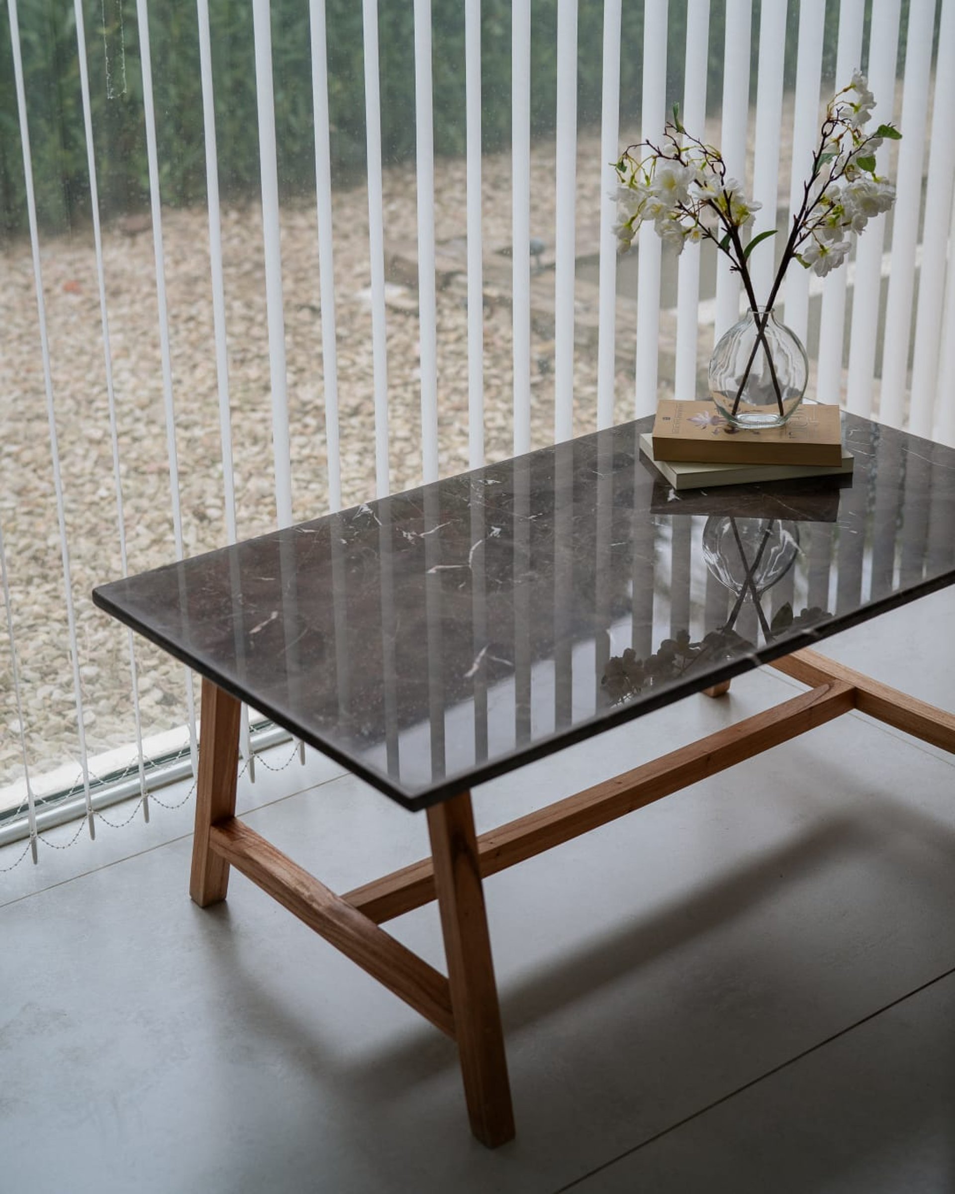 an abstract photo of a curved building with a blue sky in the background