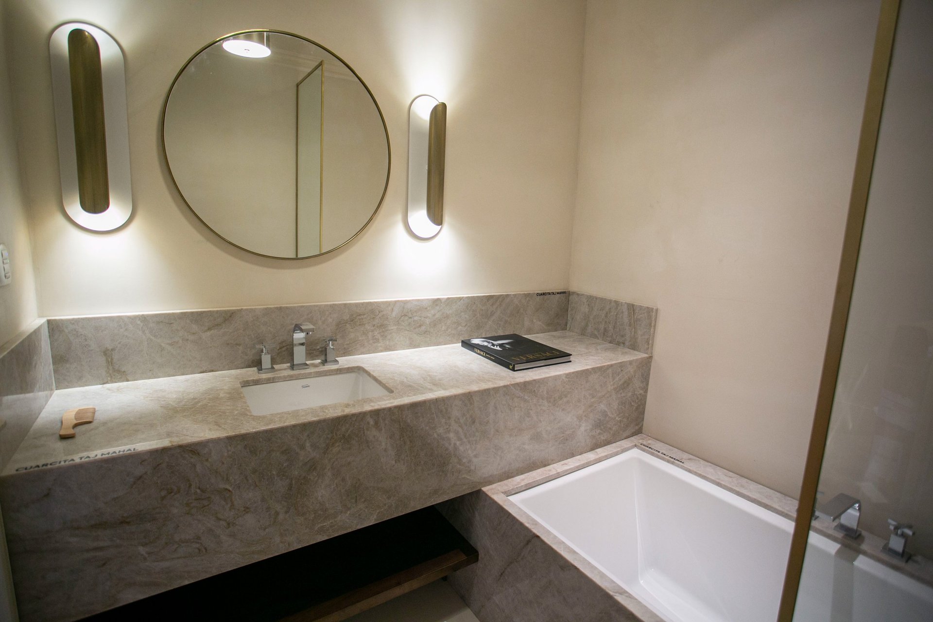 an abstract photo of a curved building with a blue sky in the background