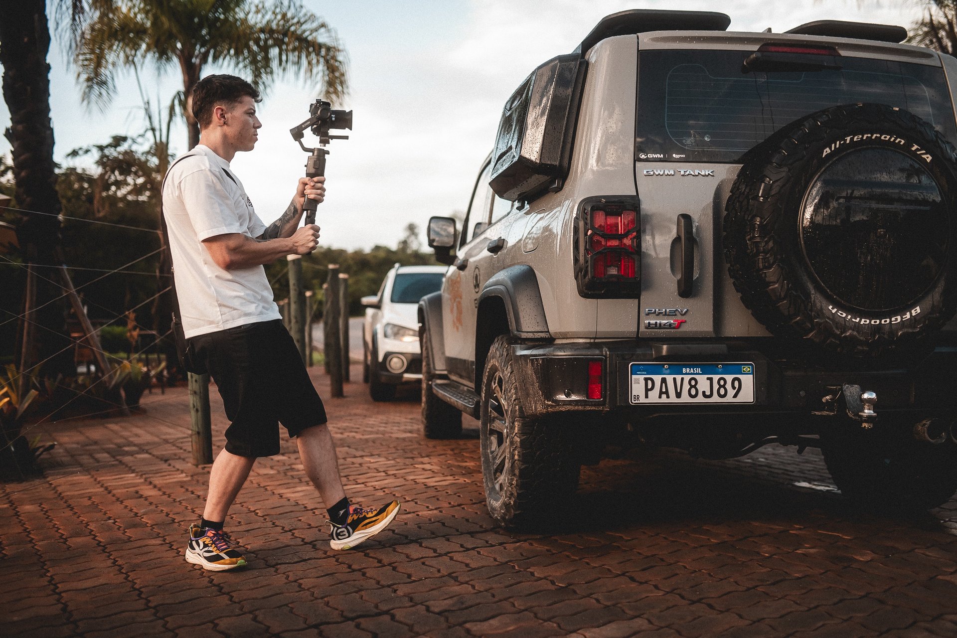 an abstract photo of a curved building with a blue sky in the background