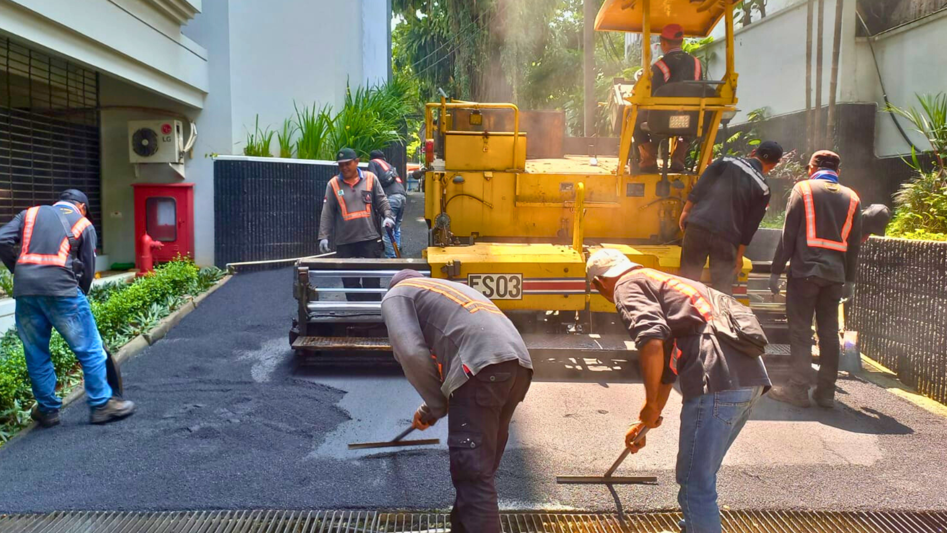 an abstract photo of a curved building with a blue sky in the background