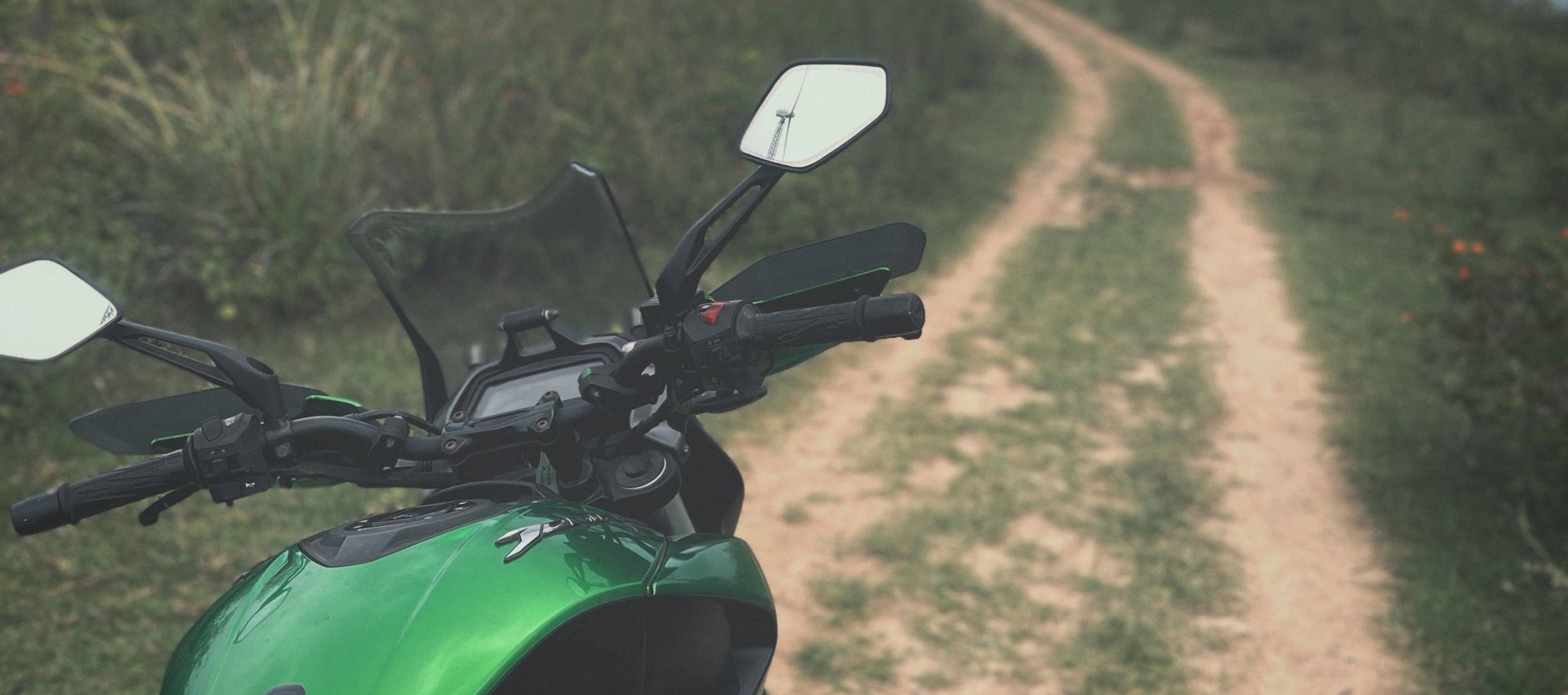 Bike standing on hill top Home page