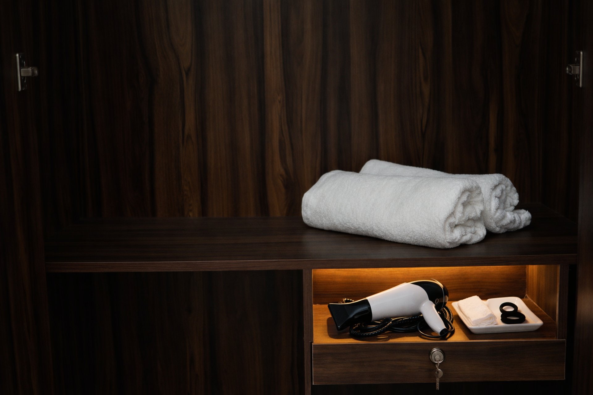 an abstract photo of a curved building with a blue sky in the background