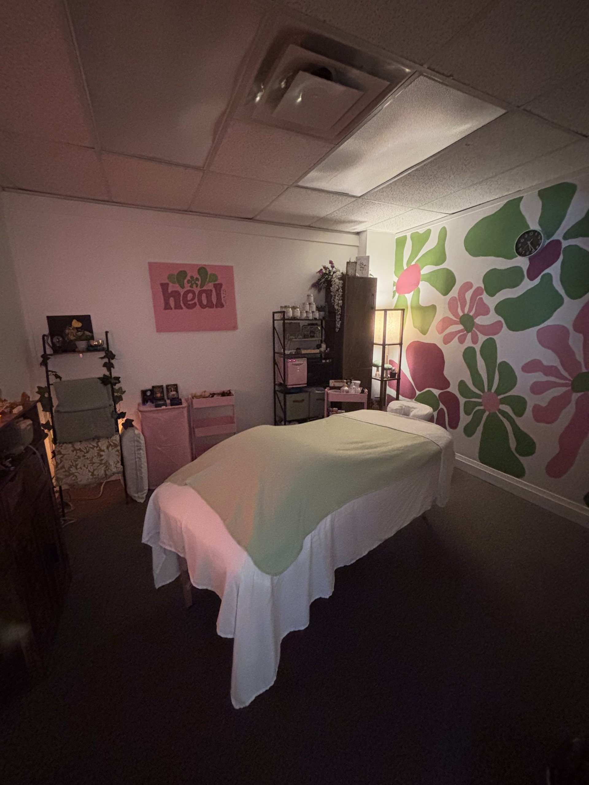 A modern recording studio with soundproofing and large window.