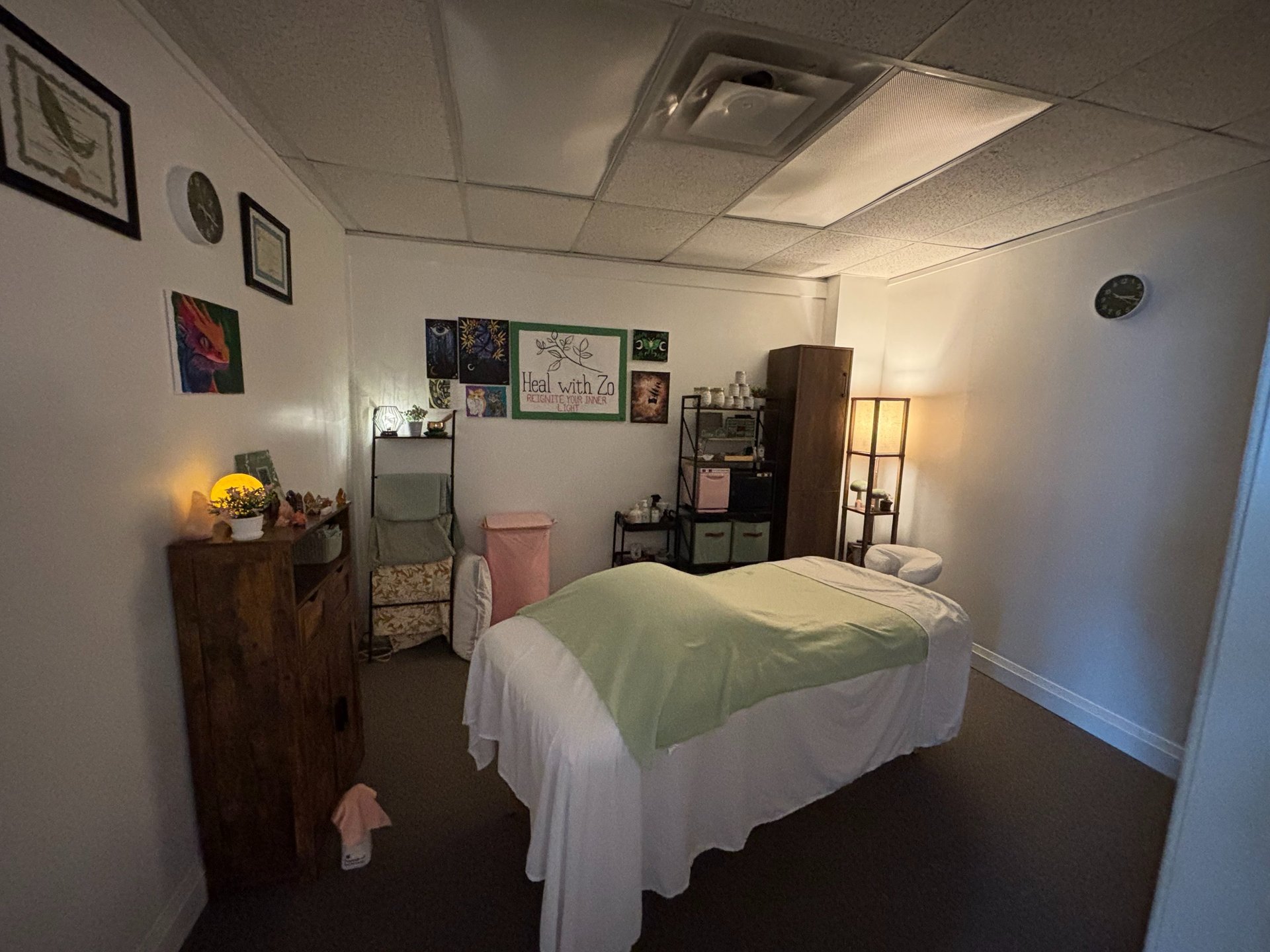 A modern recording studio with soundproofing and large window.