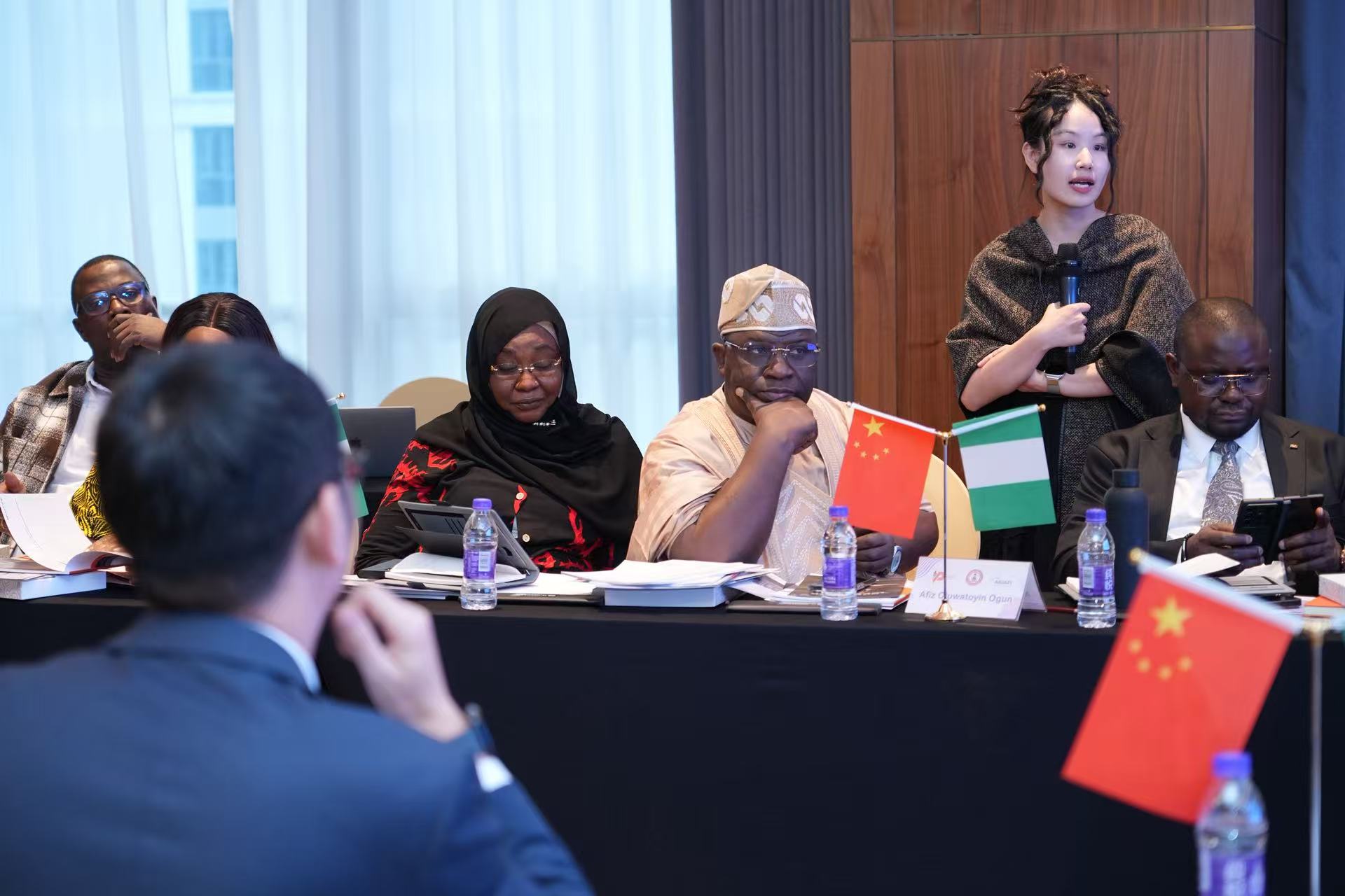 person holding white Android smartphone in white shirt