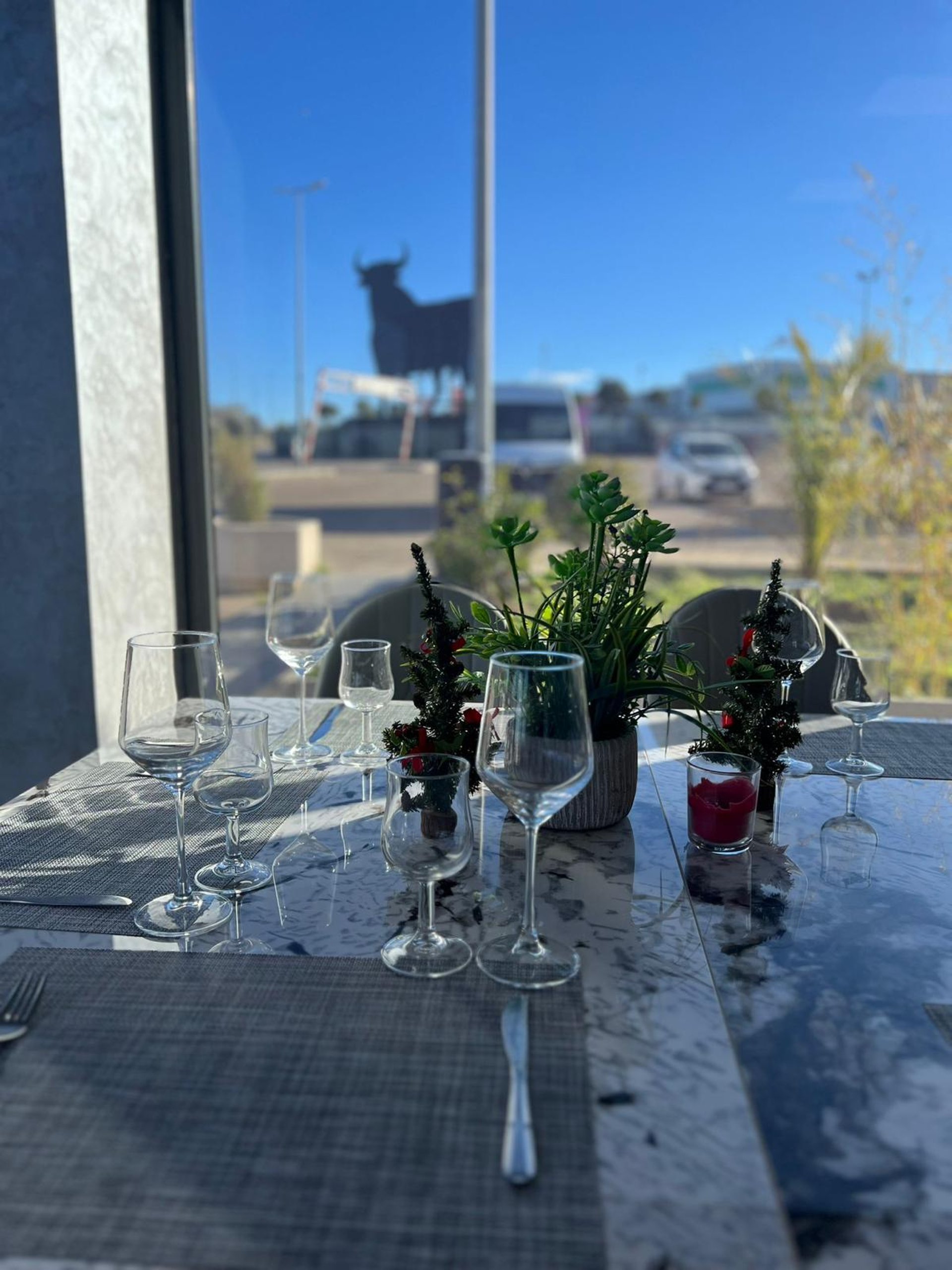 woman wearing yellow long-sleeved dress under white clouds and blue sky during daytime