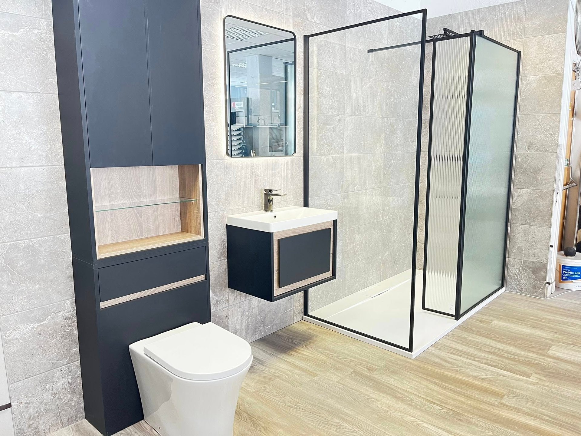 a close up of a black and brown abstract painting