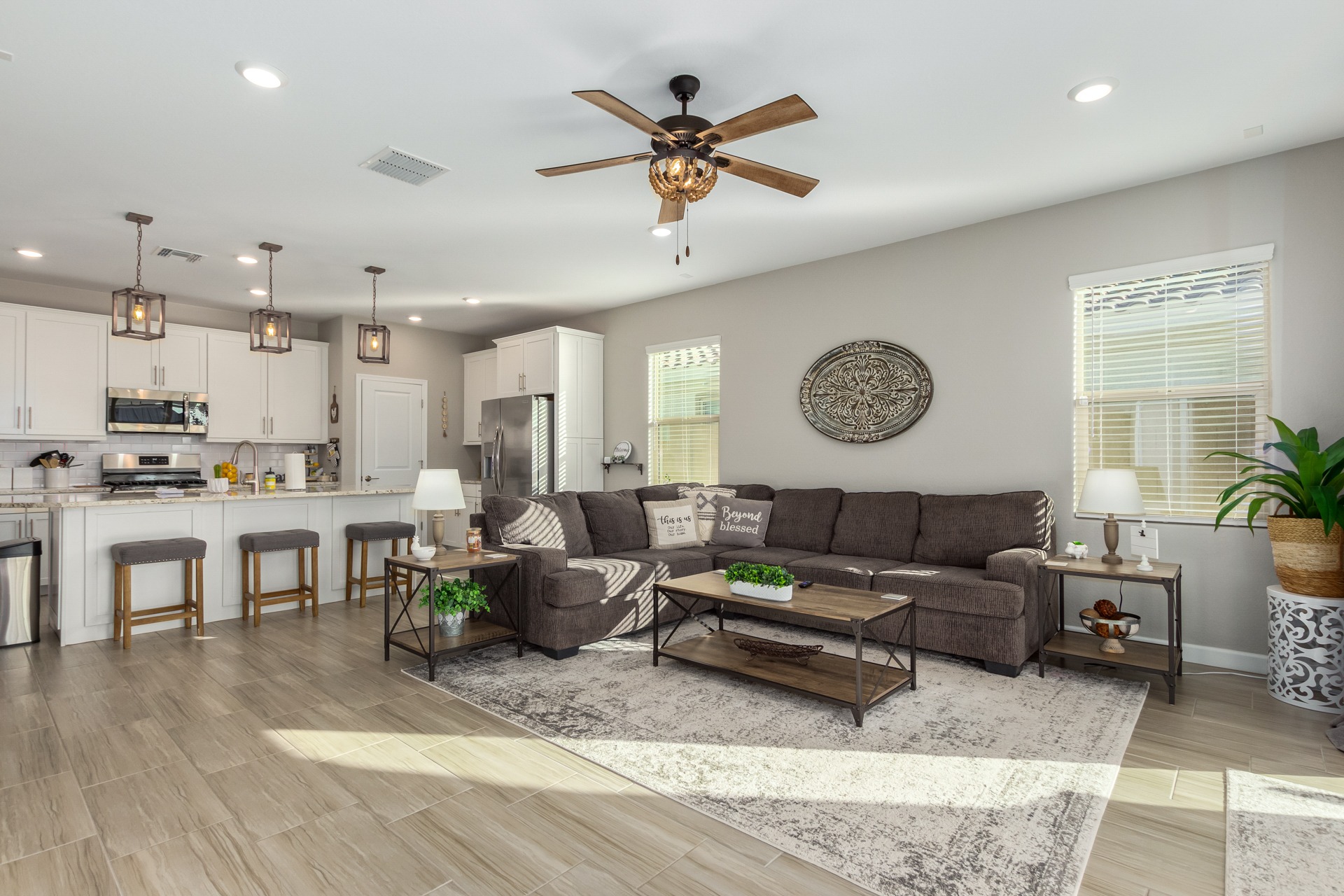 silhouette of man standing near glass window during daytime